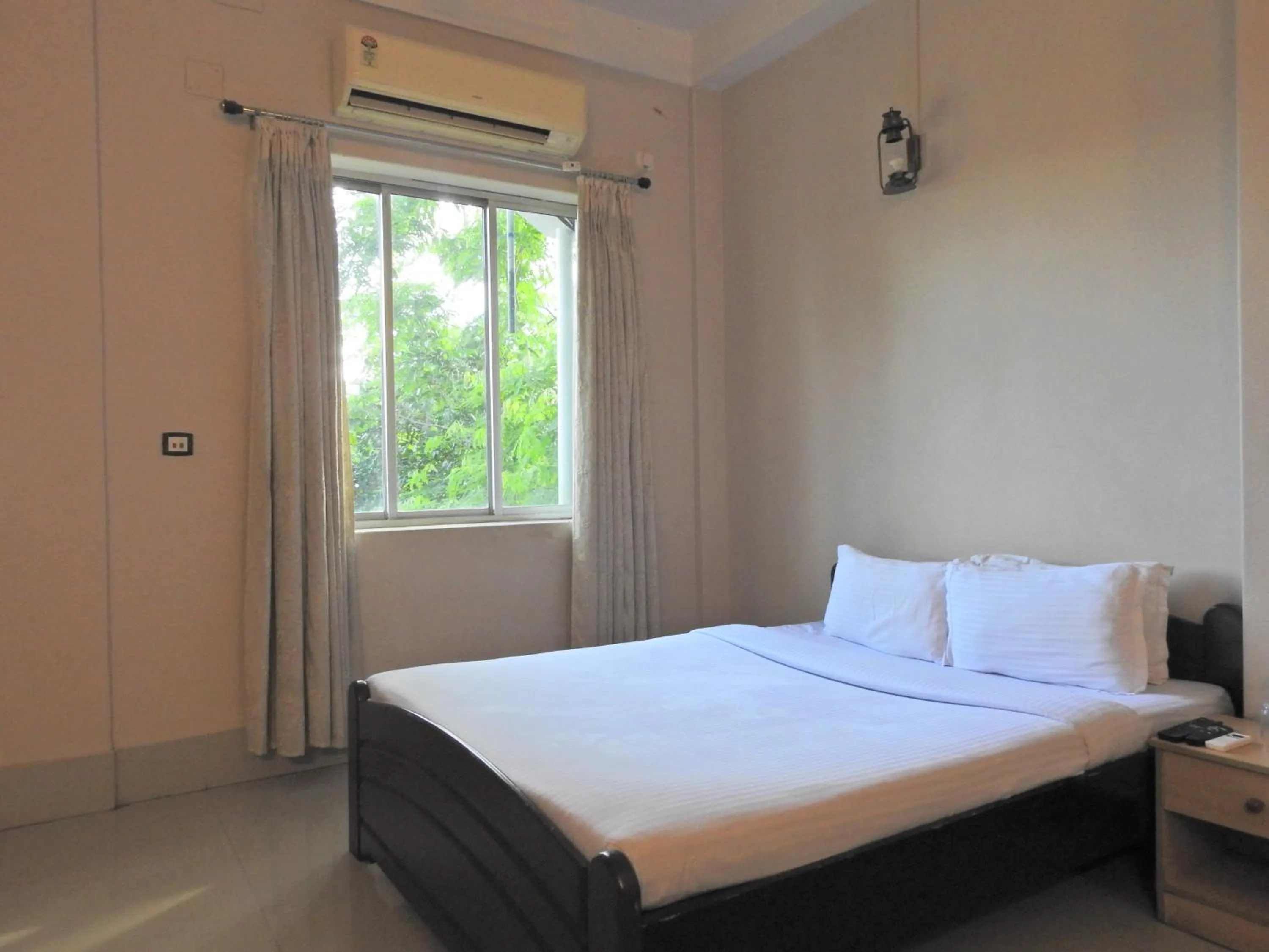 Bed in Lake Side Resort Neermahal