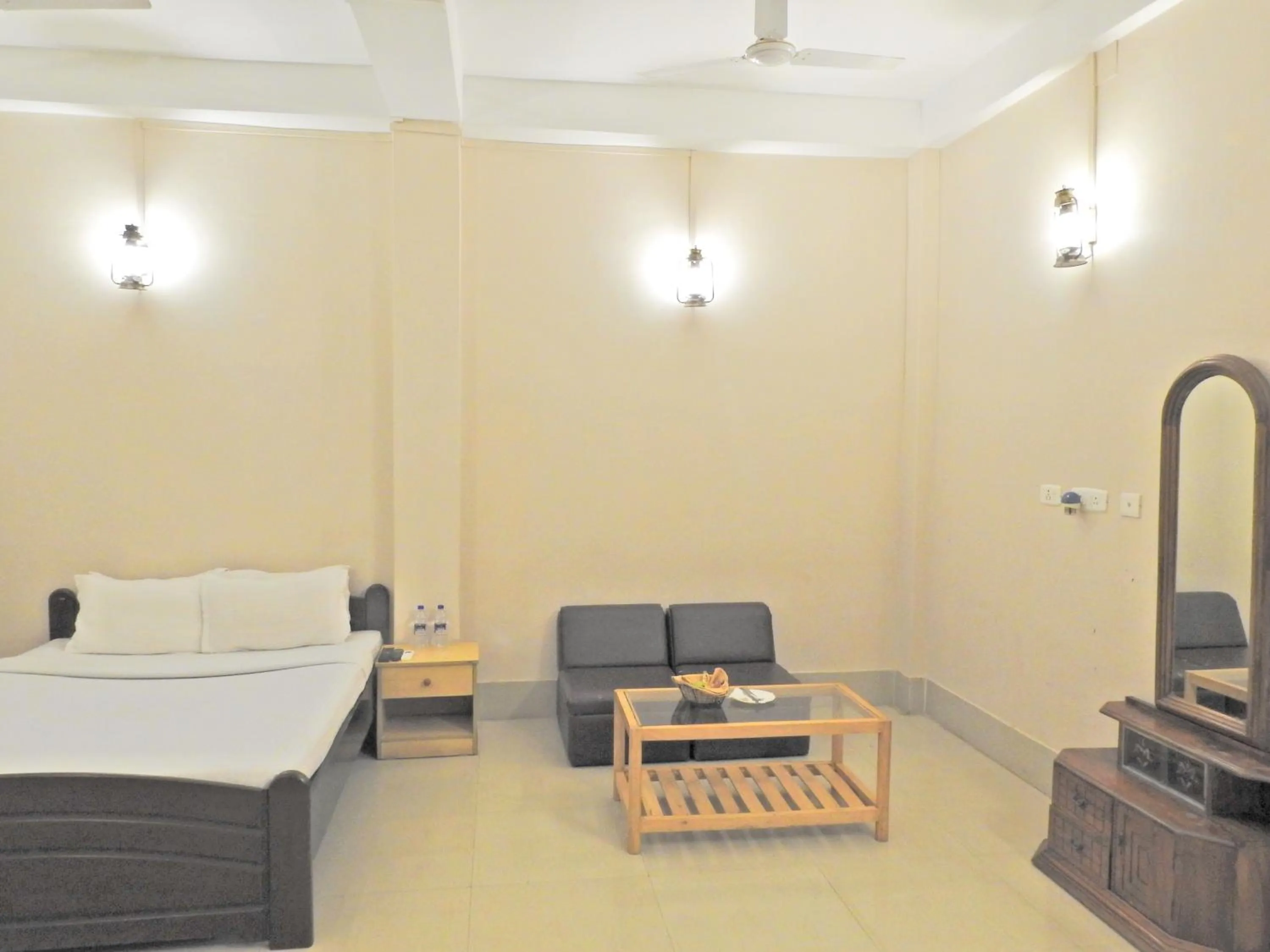 Seating area, Bed in Lake Side Resort Neermahal