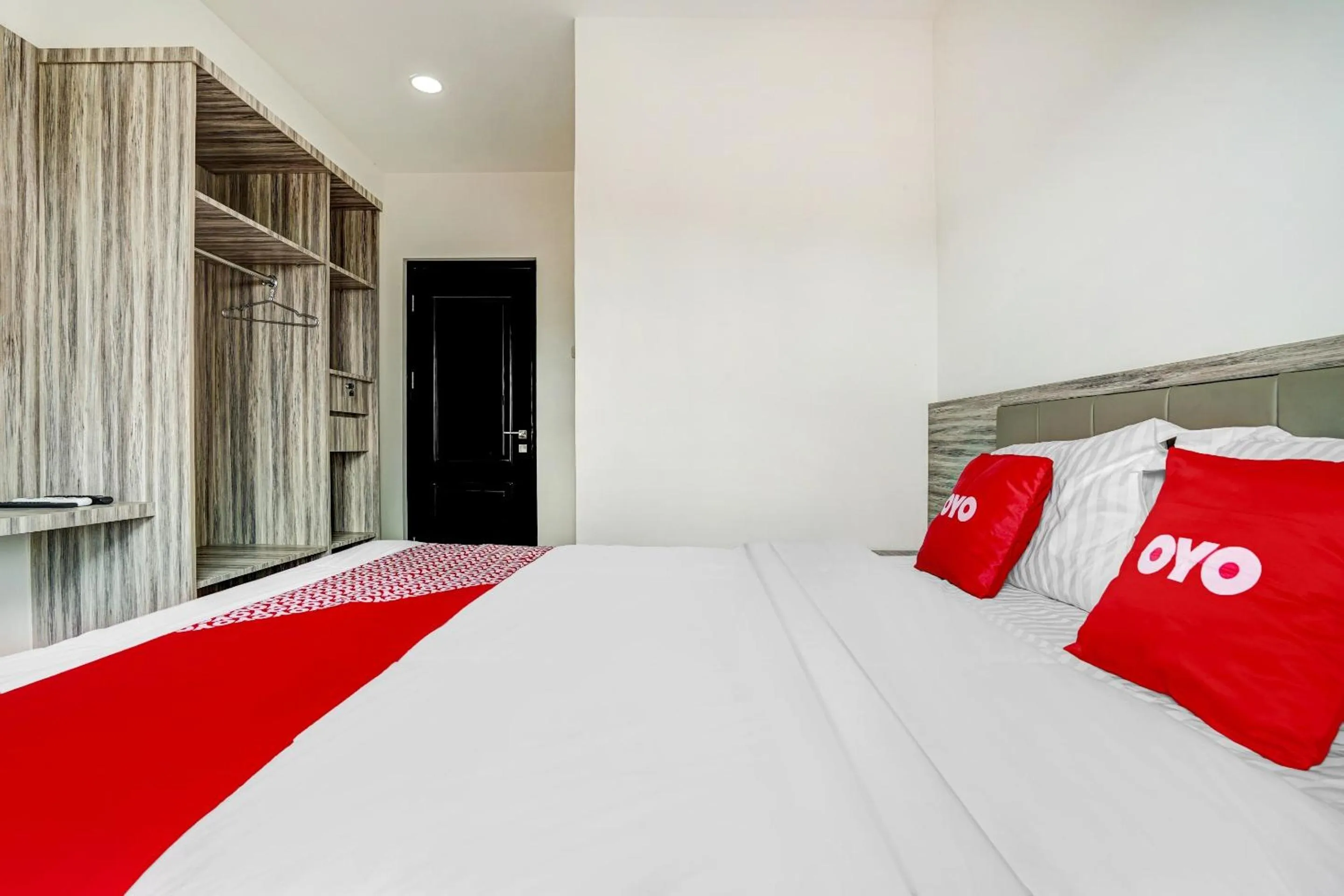 Bedroom in OYO Capital O 90164 La'rissa Residence