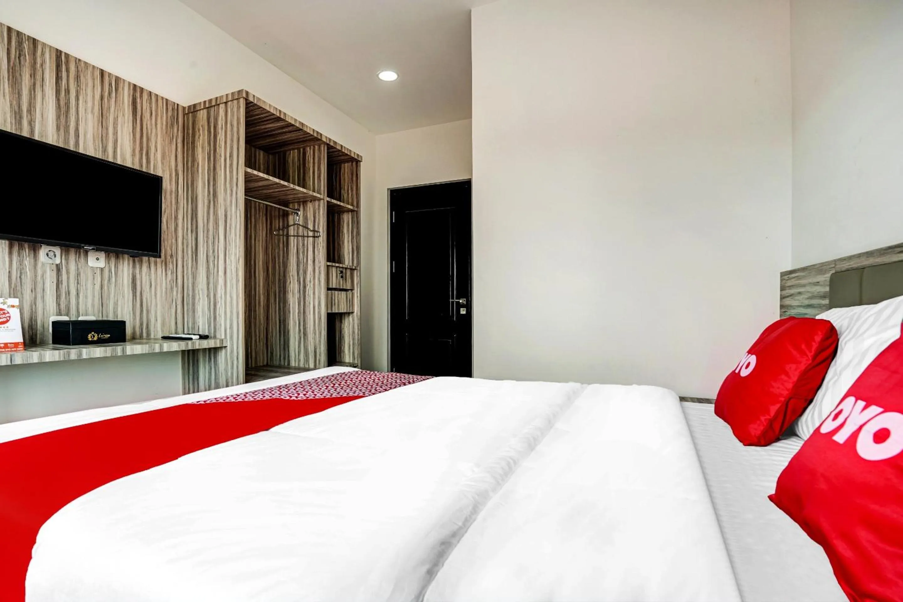 Bedroom in OYO Capital O 90164 La'rissa Residence