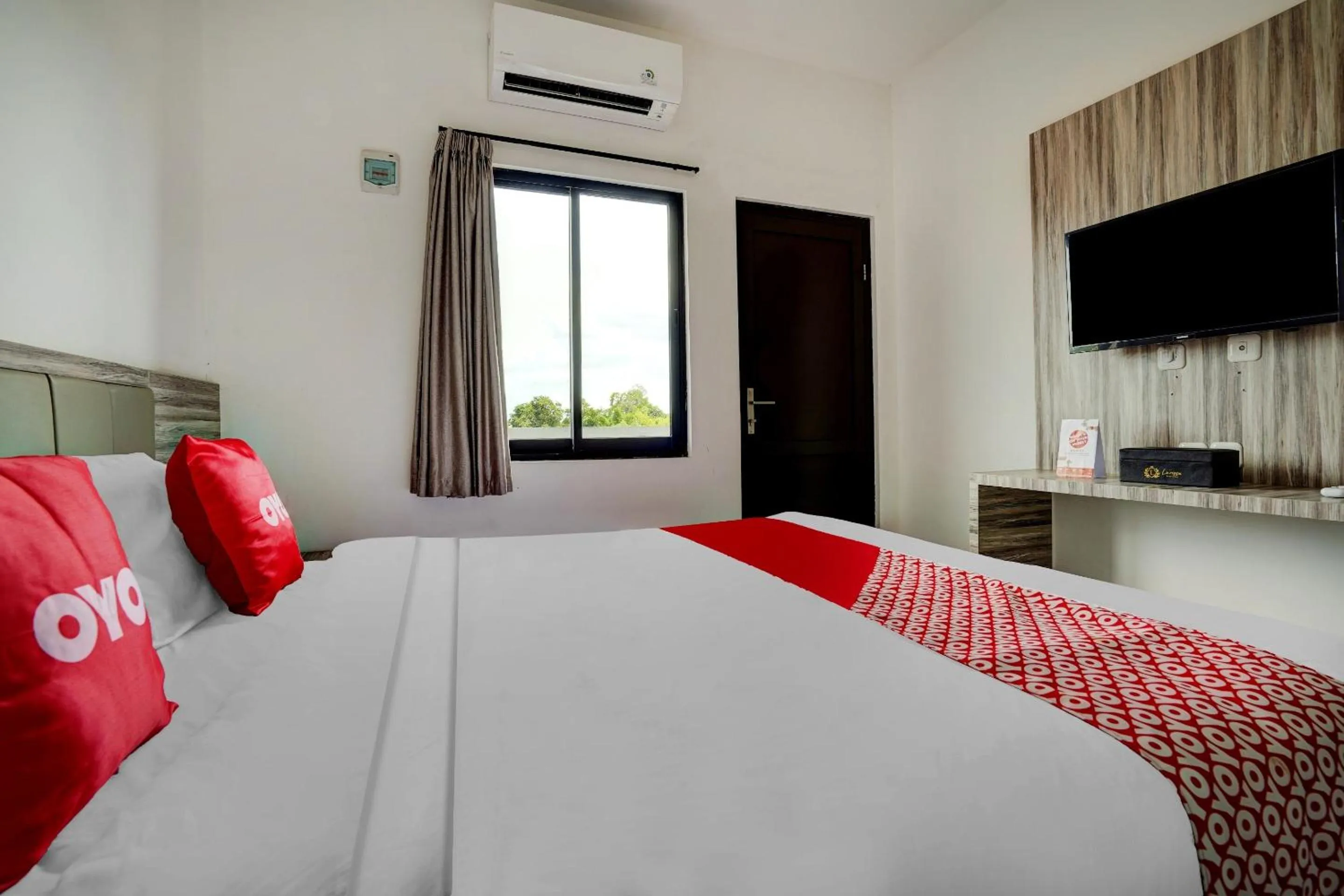 Bedroom in OYO Capital O 90164 La'rissa Residence