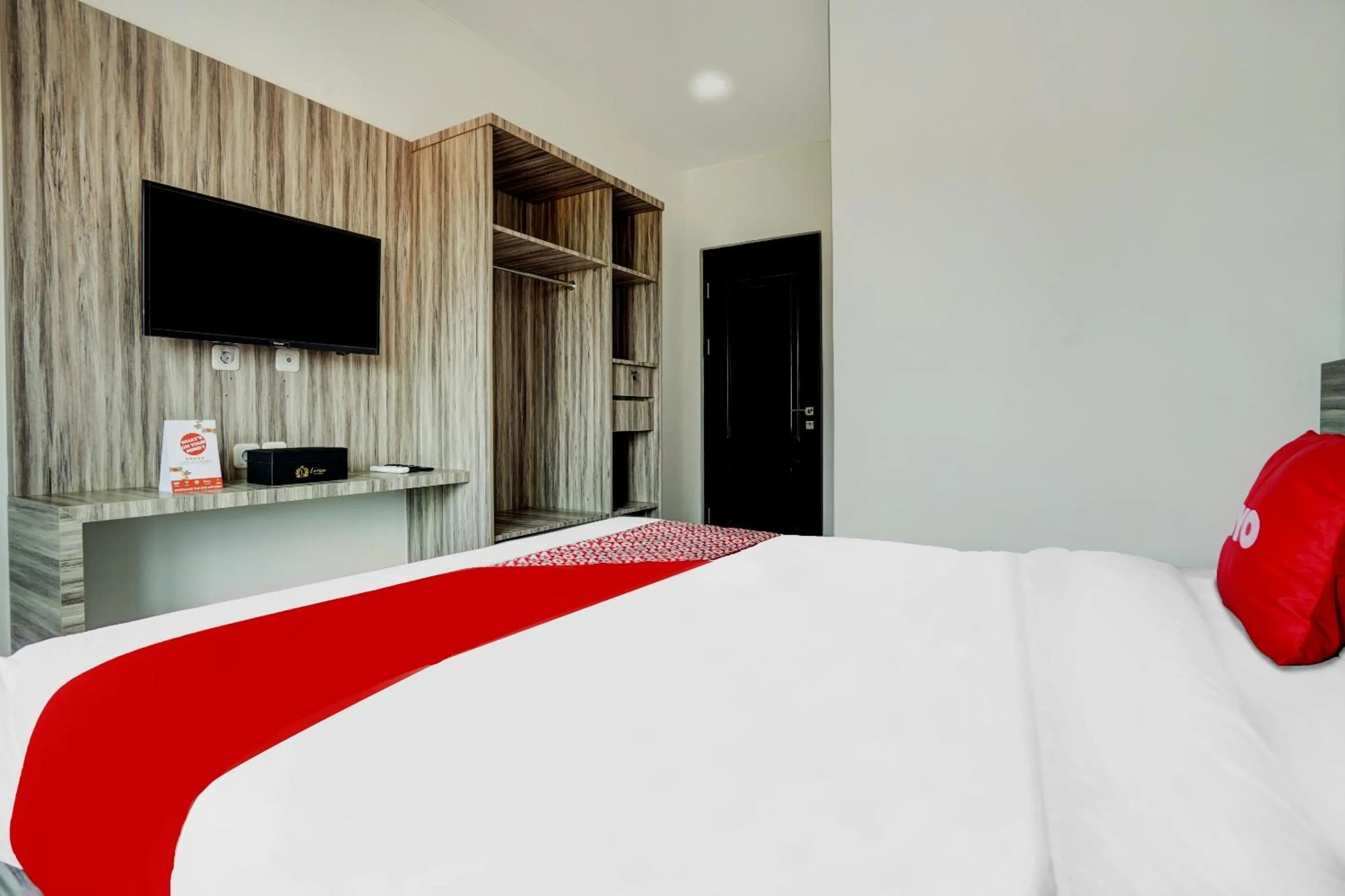 Bedroom in OYO Capital O 90164 La'rissa Residence