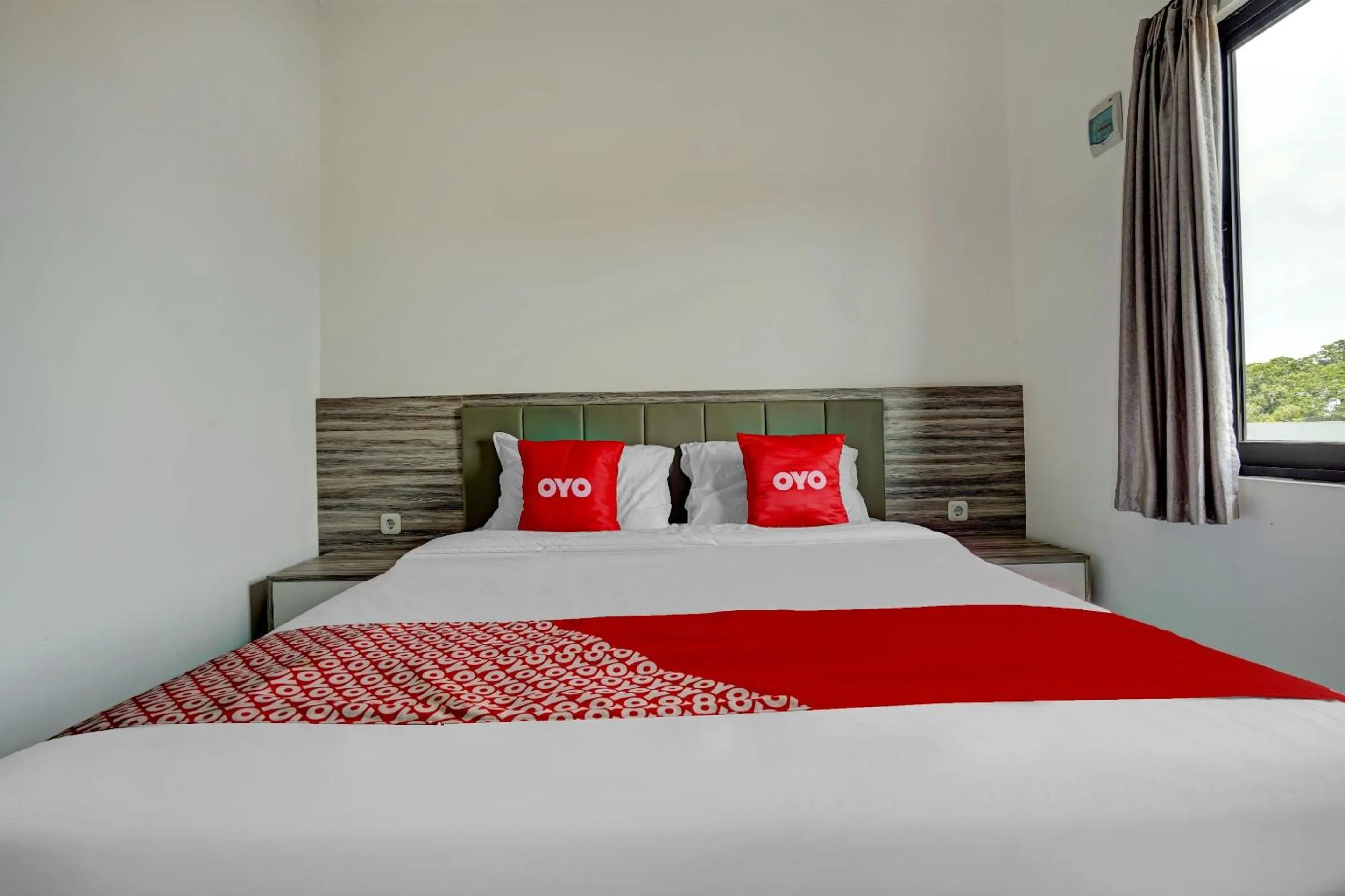 Bedroom in OYO Capital O 90164 La'rissa Residence