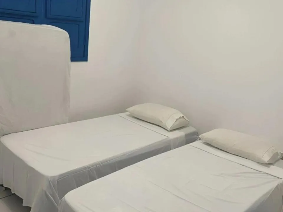 Bed in Pousada Jirituba