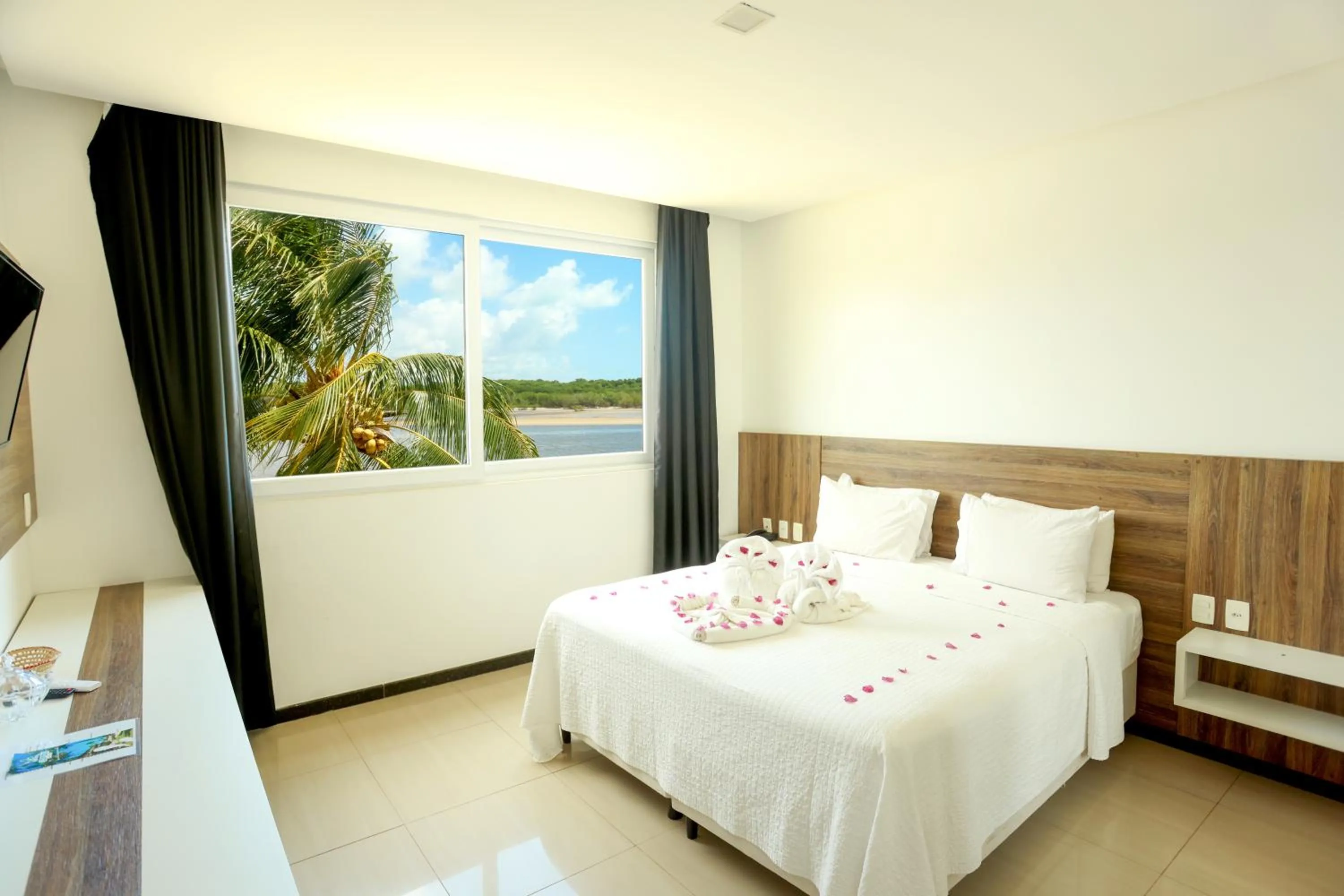 Bed in Pousada Jirituba