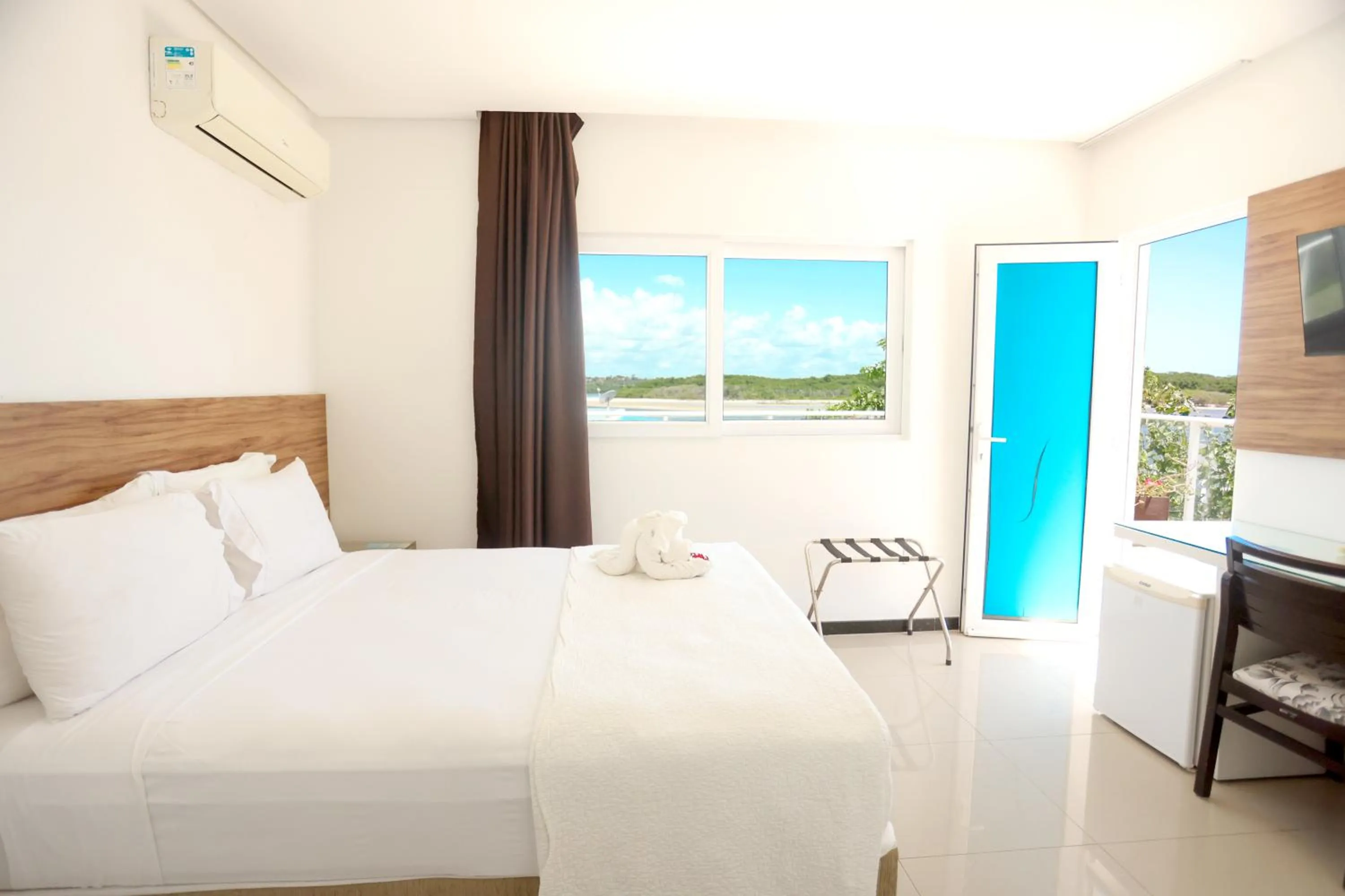 Bed in Pousada Jirituba