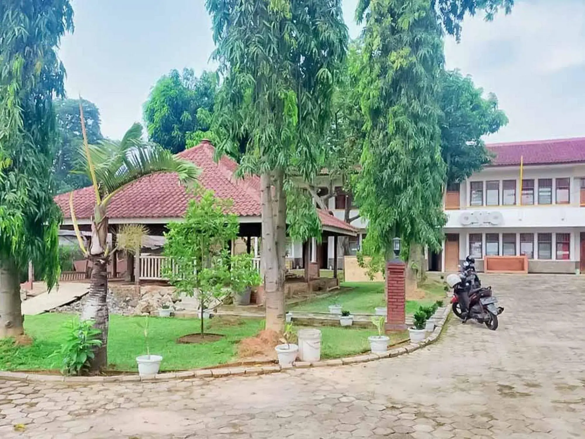 Property building in Rumah Pahoman Syariah Mitra RedDoorz Property building in Rumah Pahoman Syariah Mitra RedDoorz