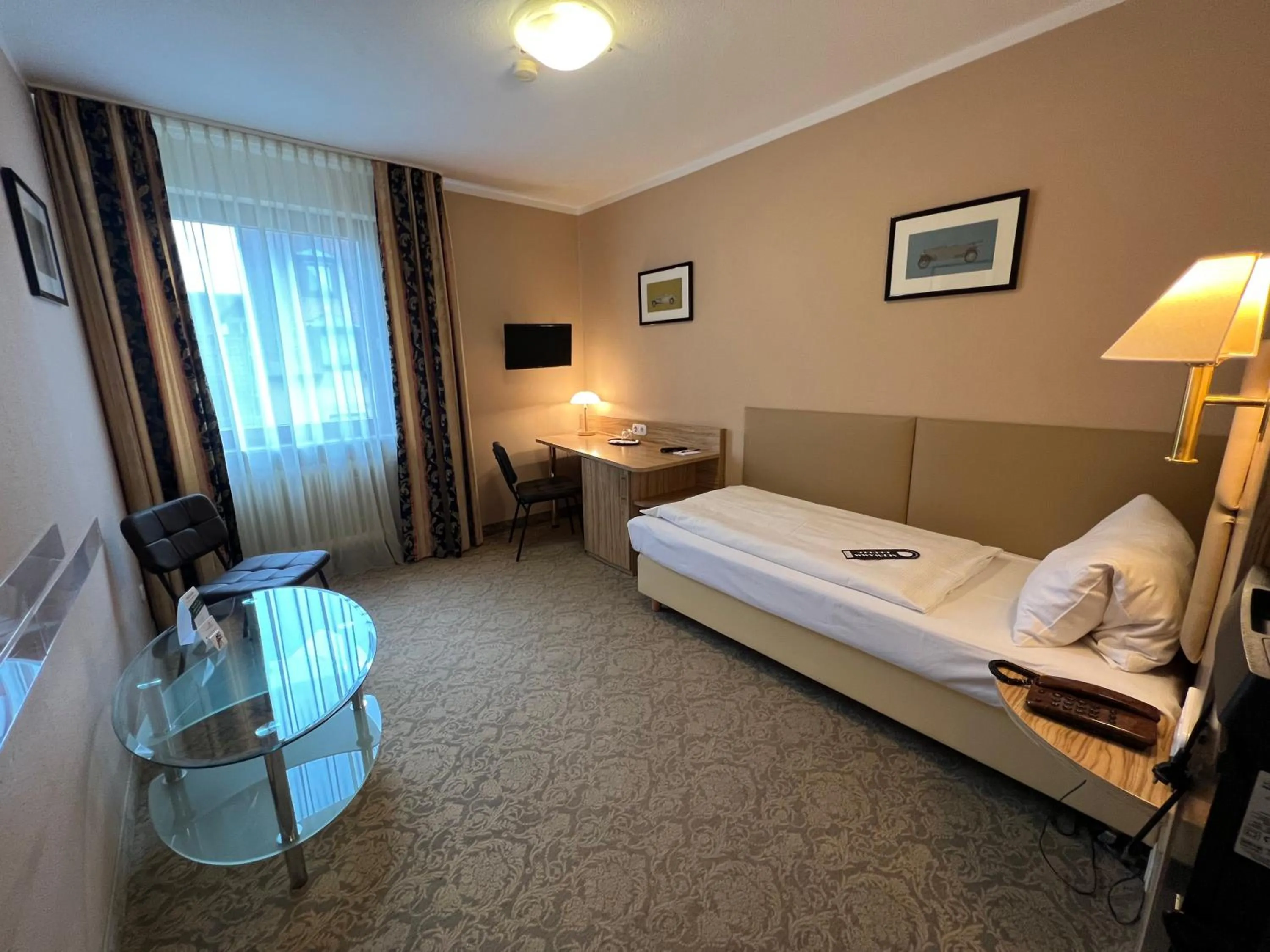 Photo of the whole room, Bed in Aparthotel Deutschmeister