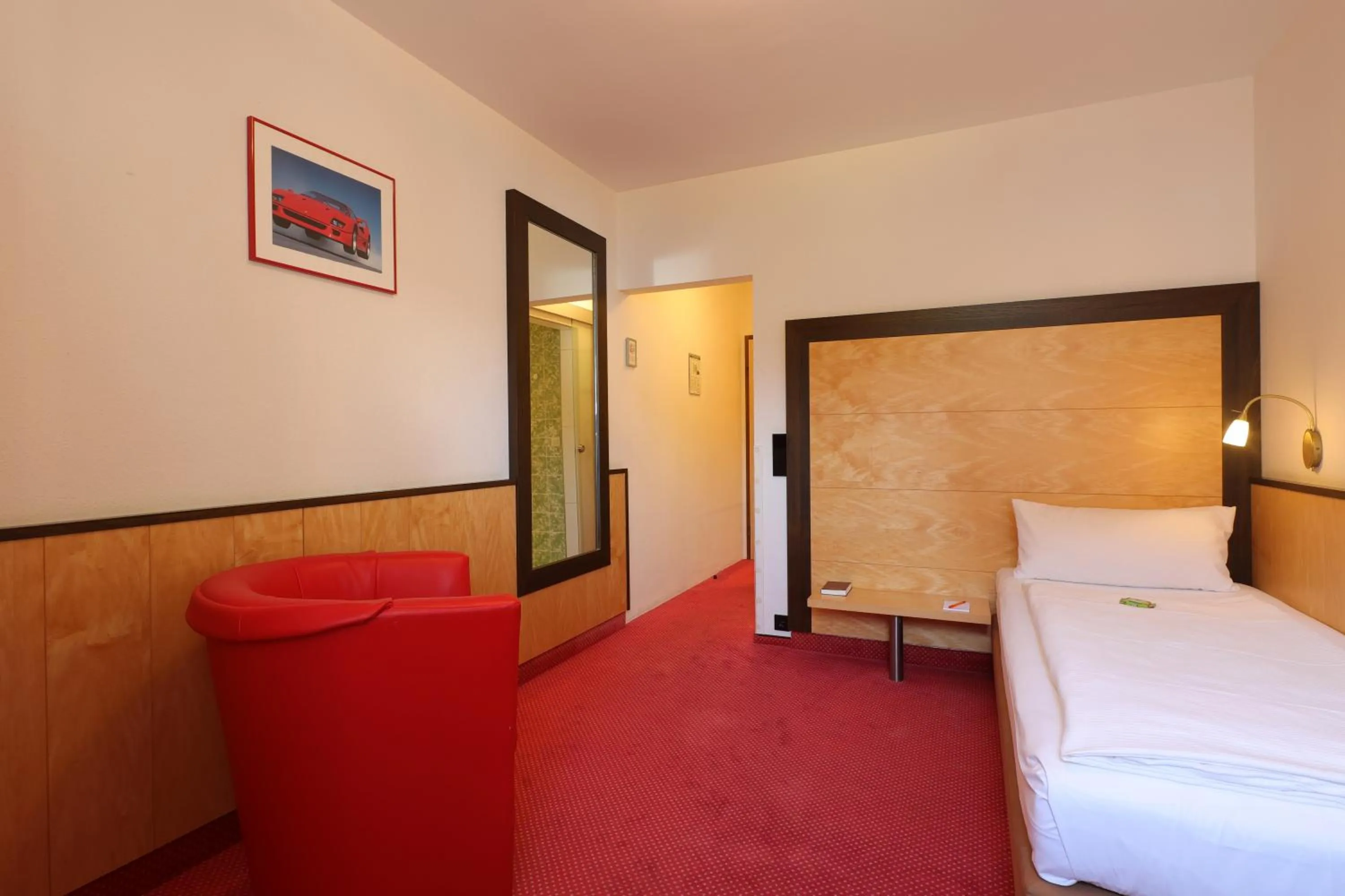 Bed in Aparthotel Deutschmeister