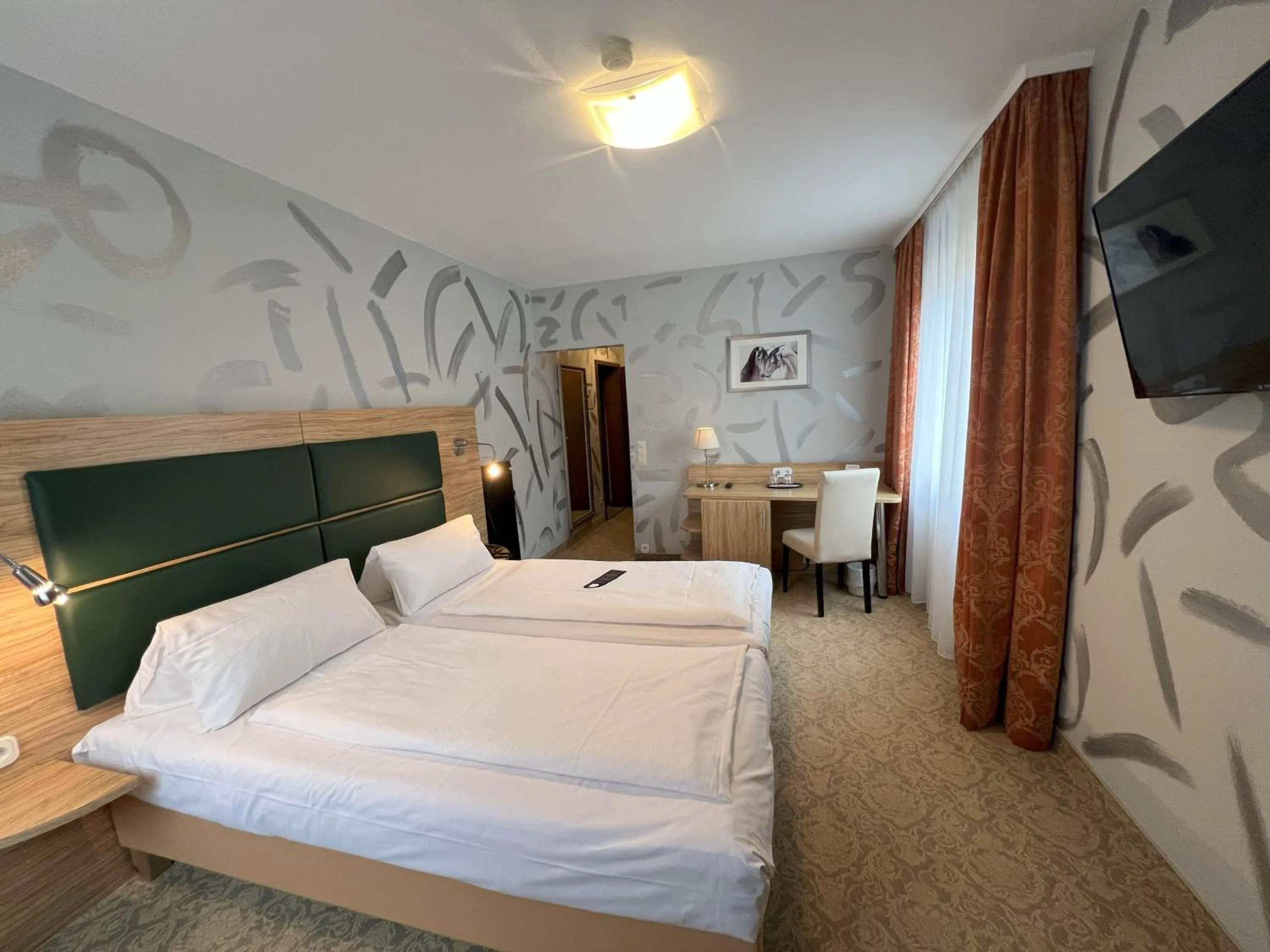 Photo of the whole room, Bed in Aparthotel Deutschmeister