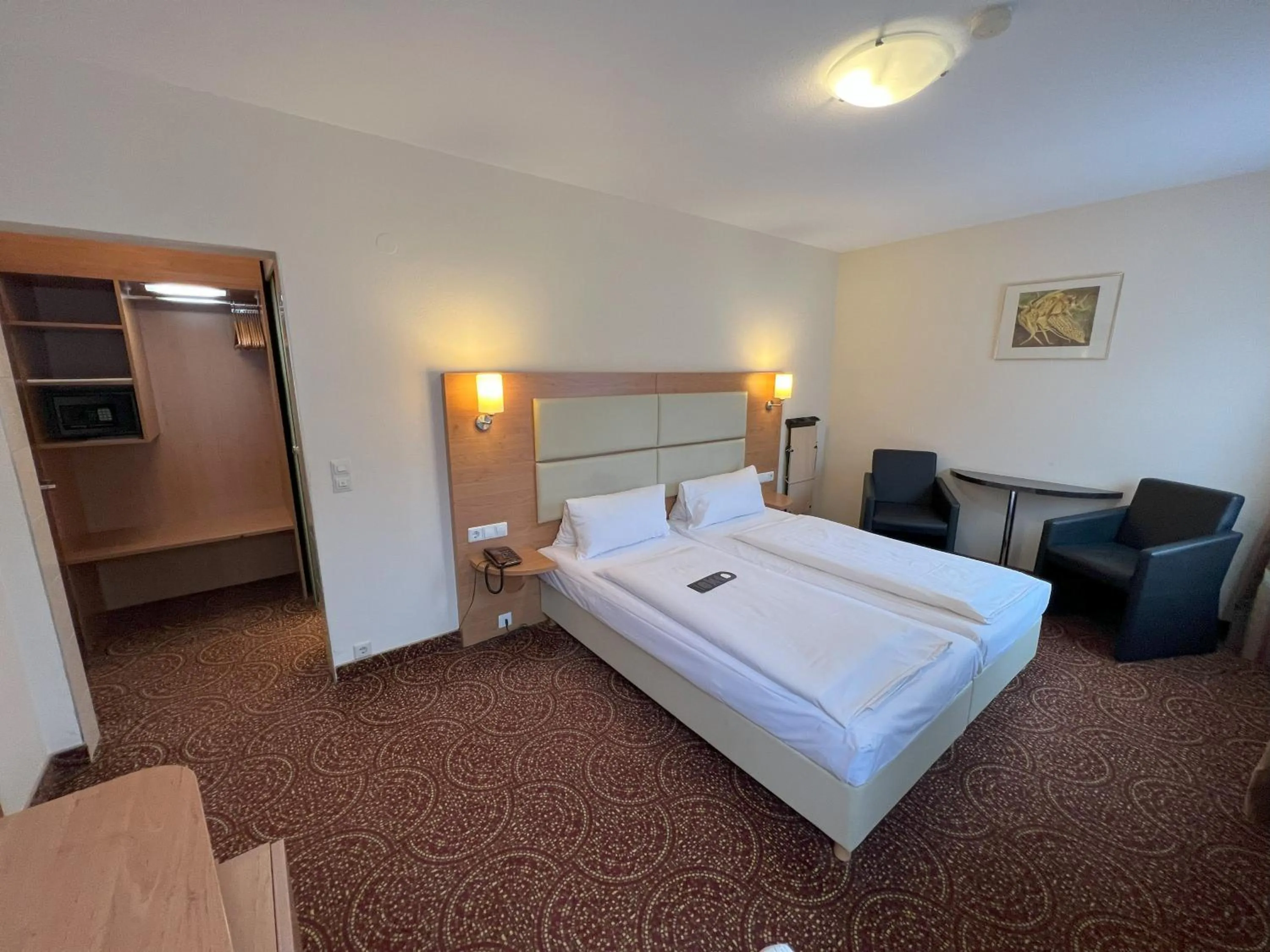 Photo of the whole room, Bed in Aparthotel Deutschmeister