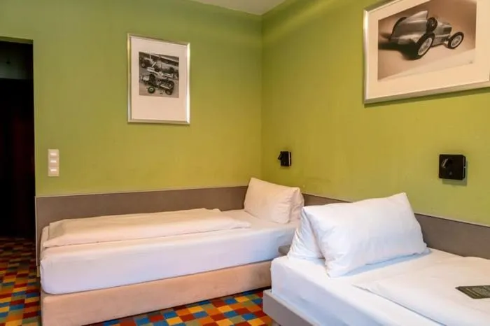 Photo of the whole room, Bed in Aparthotel Deutschmeister