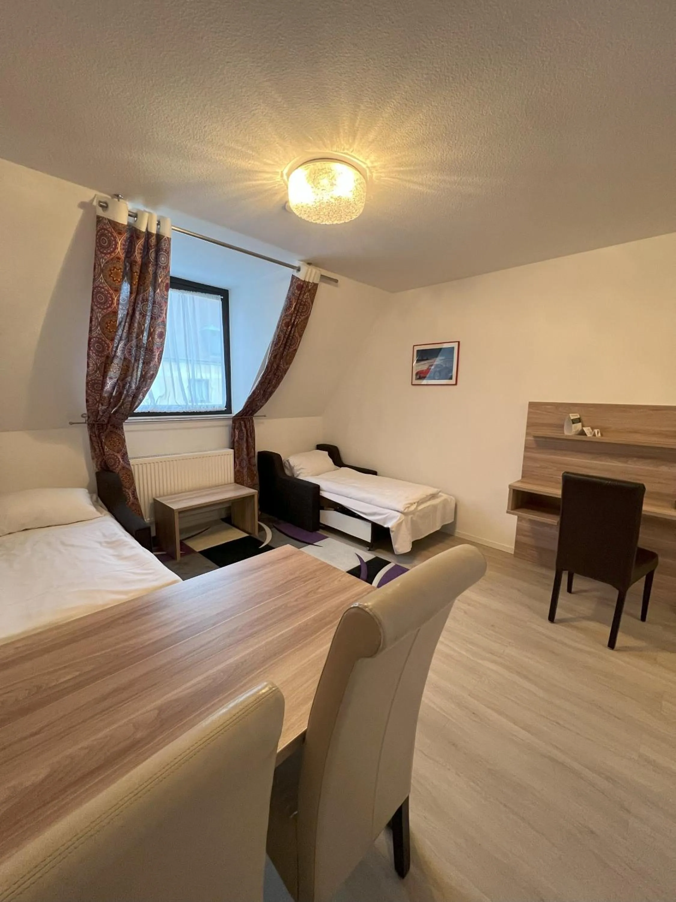 Photo of the whole room, Bed in Aparthotel Deutschmeister