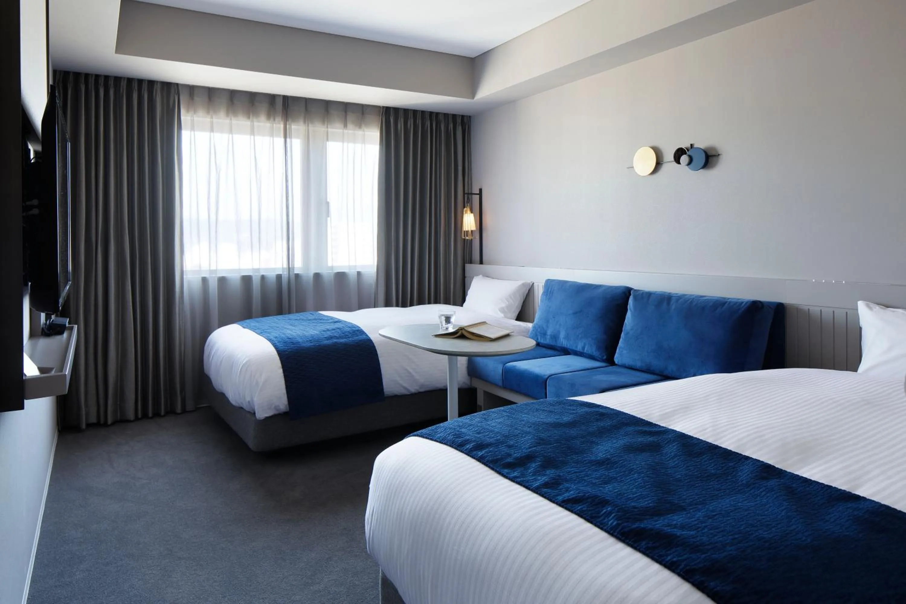 Bed in HOTEL TORIFITO KANAZAWA