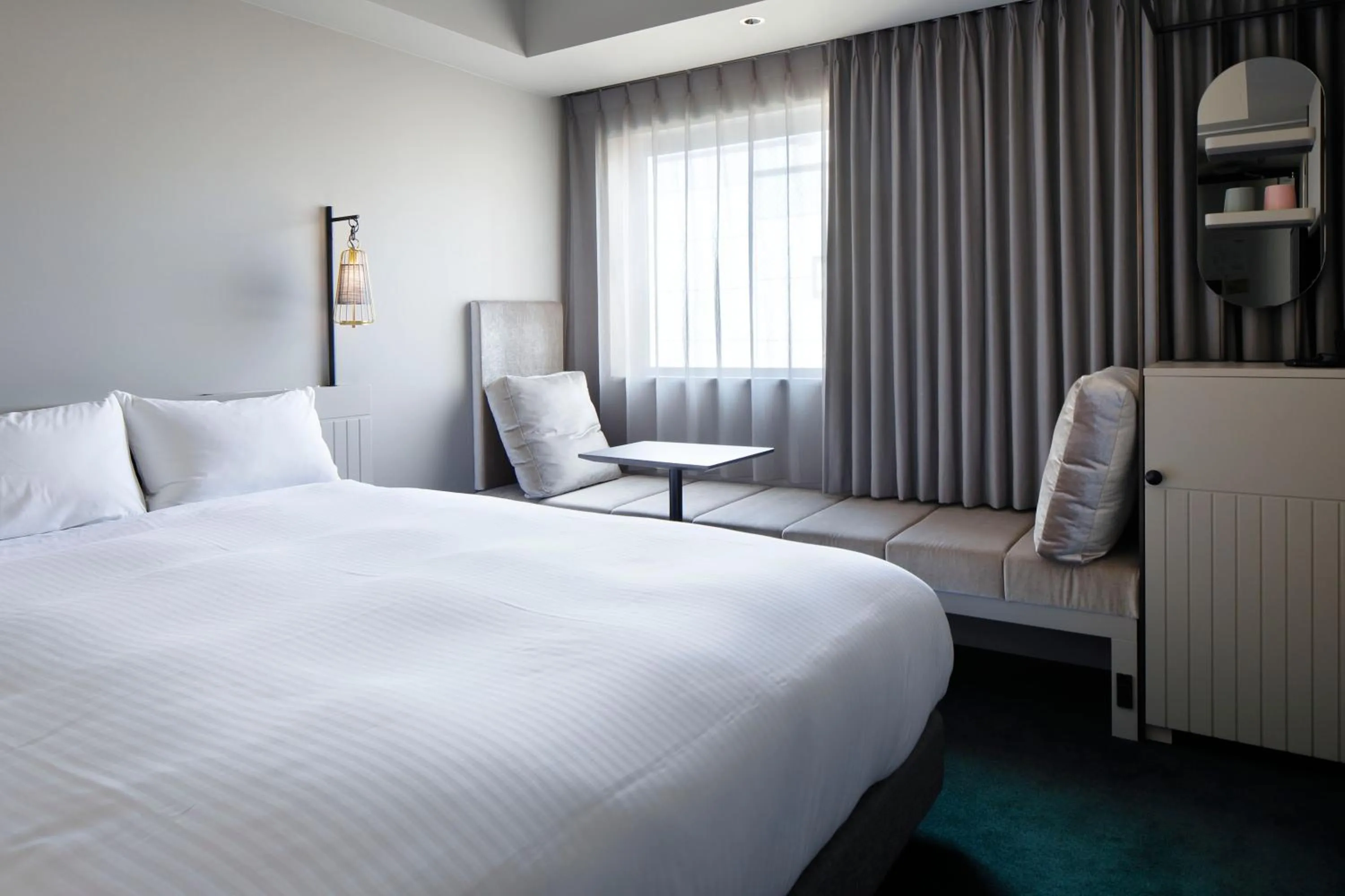 Bed in HOTEL TORIFITO KANAZAWA