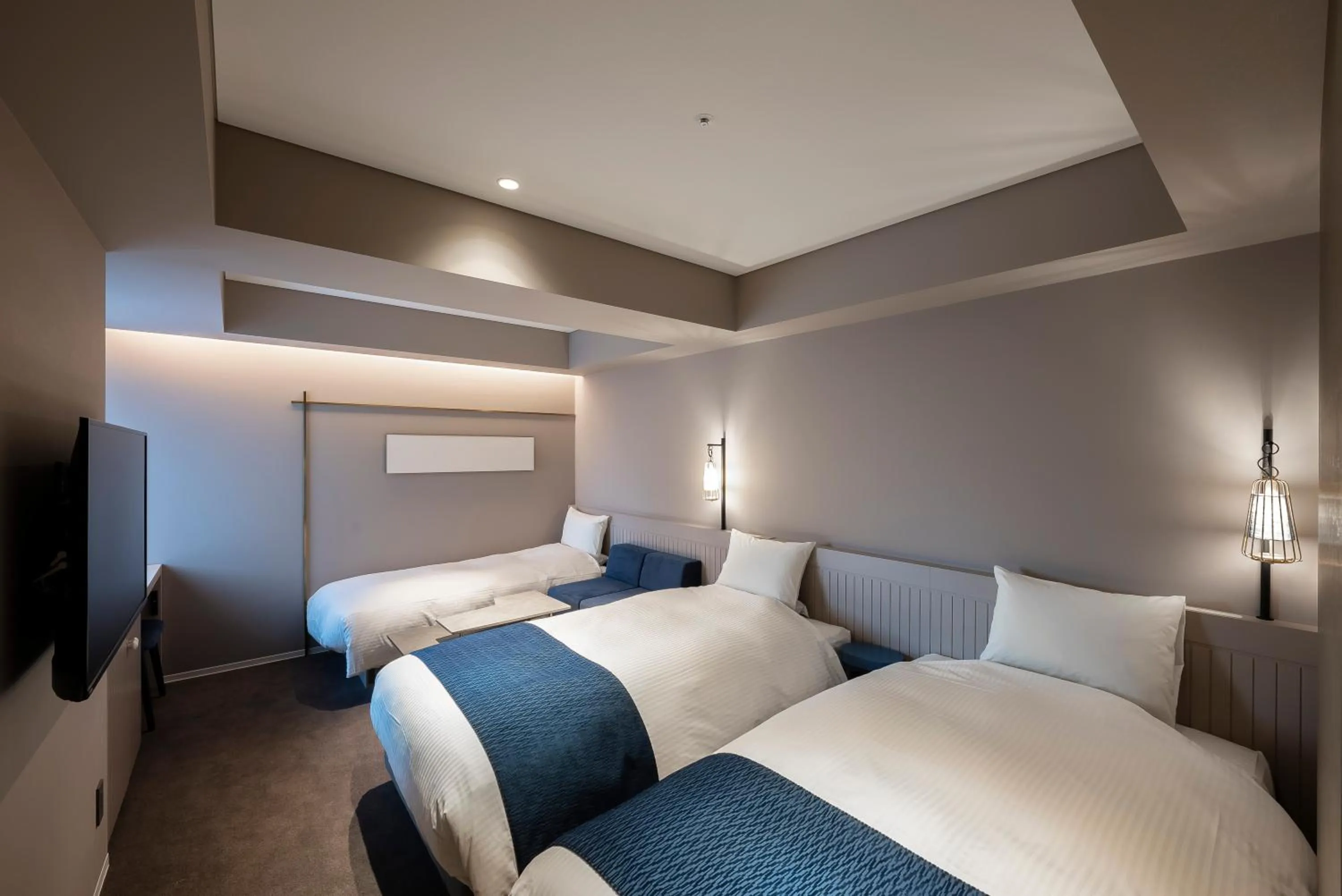 Bed in HOTEL TORIFITO KANAZAWA