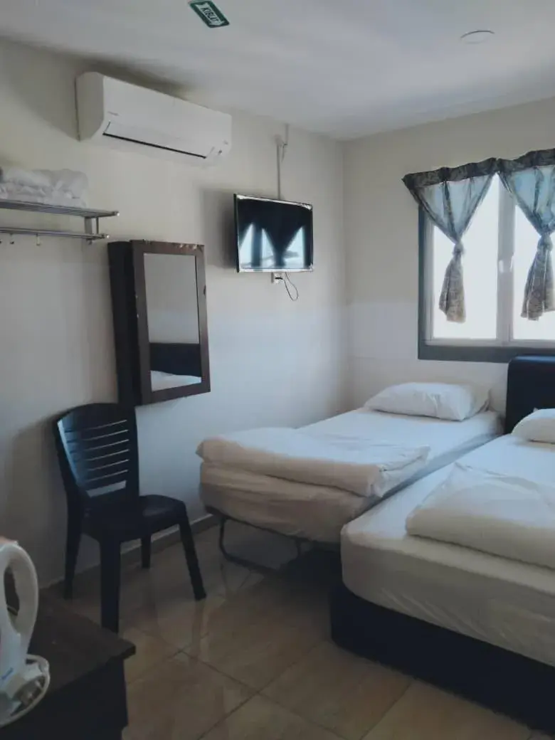 Bed in Axlite Hotel Bed in Axlite Hotel