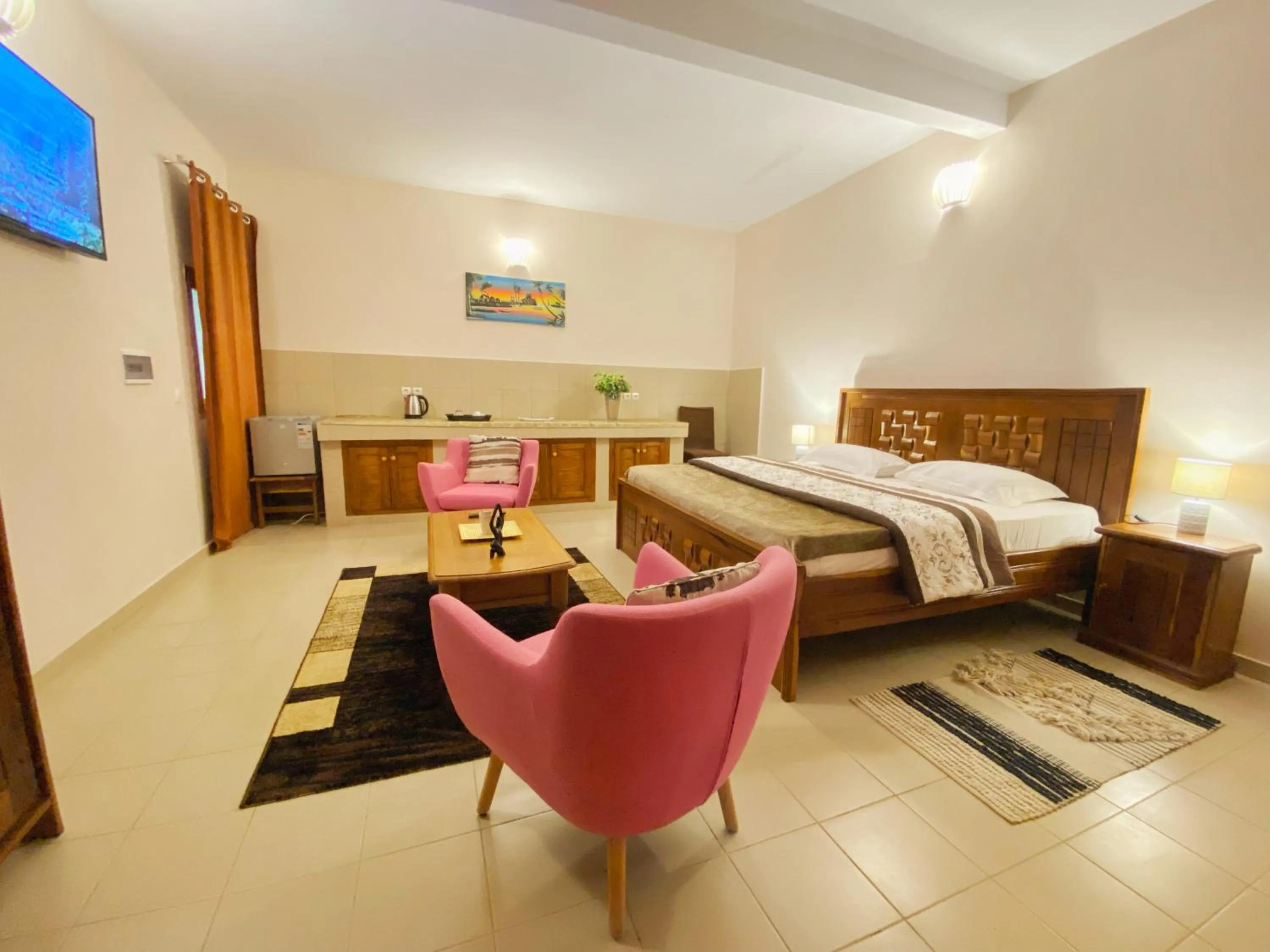 Communal lounge/ TV room, Bed in Hôtel La Belle Etoile & SPA