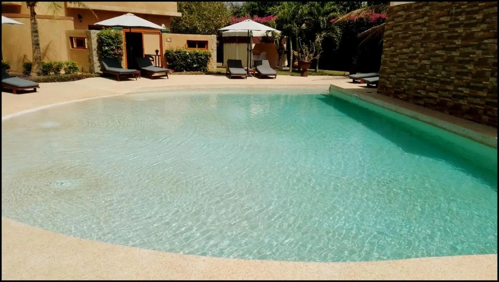 Swimming pool in Hôtel La Belle Etoile & SPA