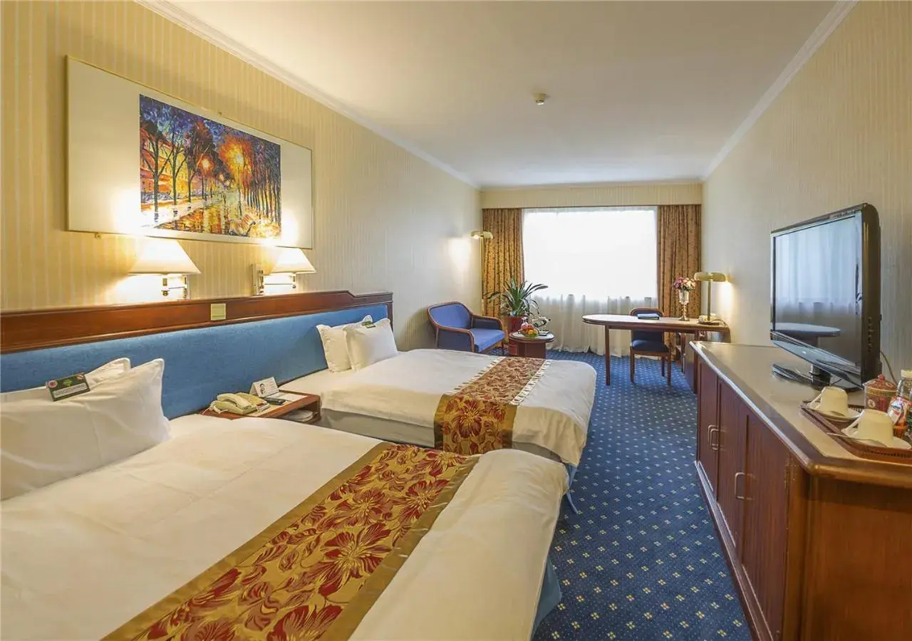 Bed in CITIC Hotel Beijing Airport Bed in CITIC Hotel Beijing Airport