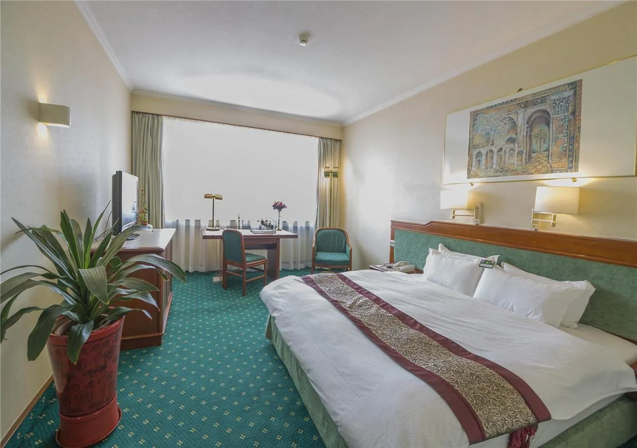 Bed in CITIC Hotel Beijing Airport