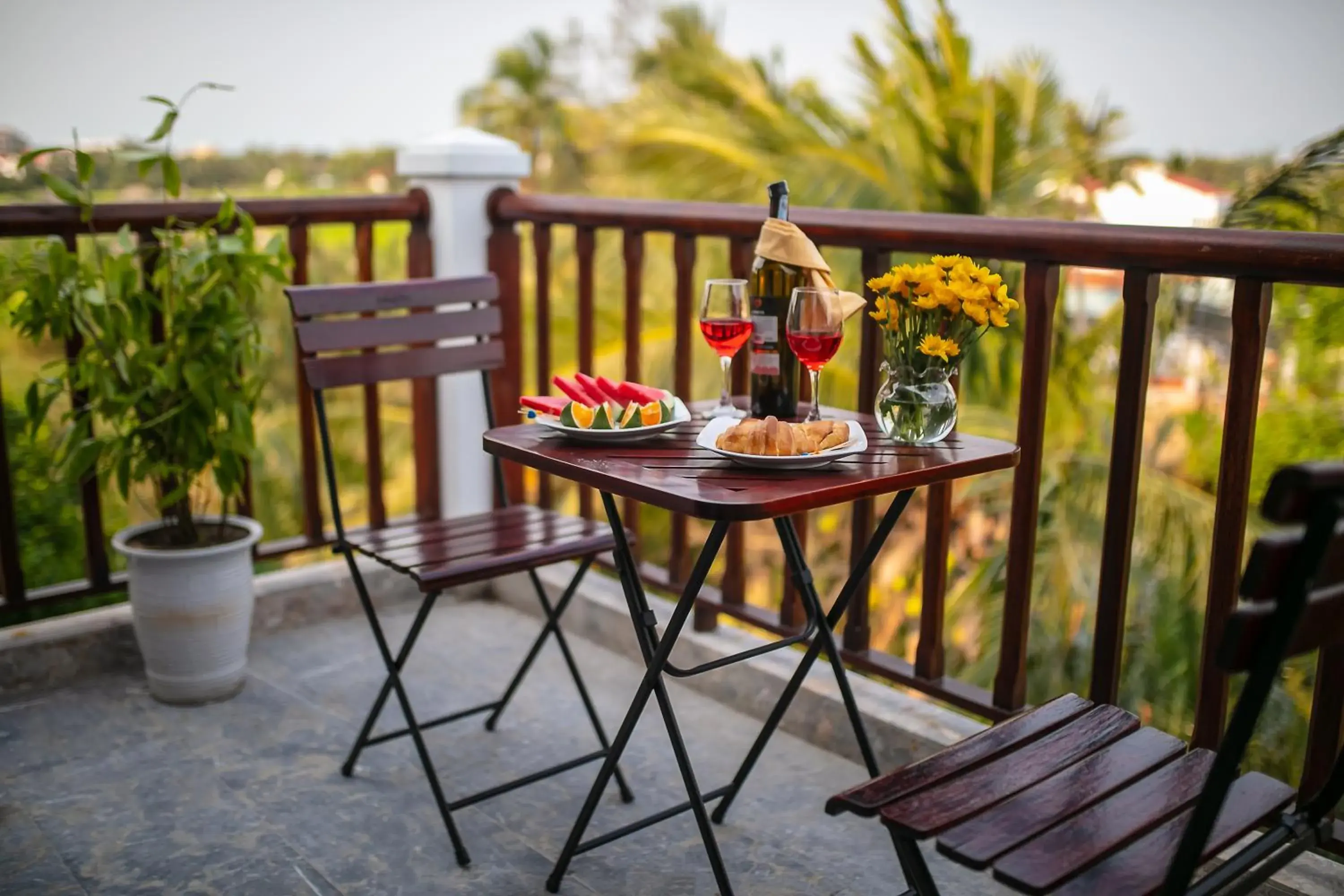 Deluxe Triple Room with Panaroma View Balcony in Hoi An Riverside Villas & Apartments Deluxe Triple Room with Panaroma View Balcony in Hoi An Riverside Villas & Apartments
