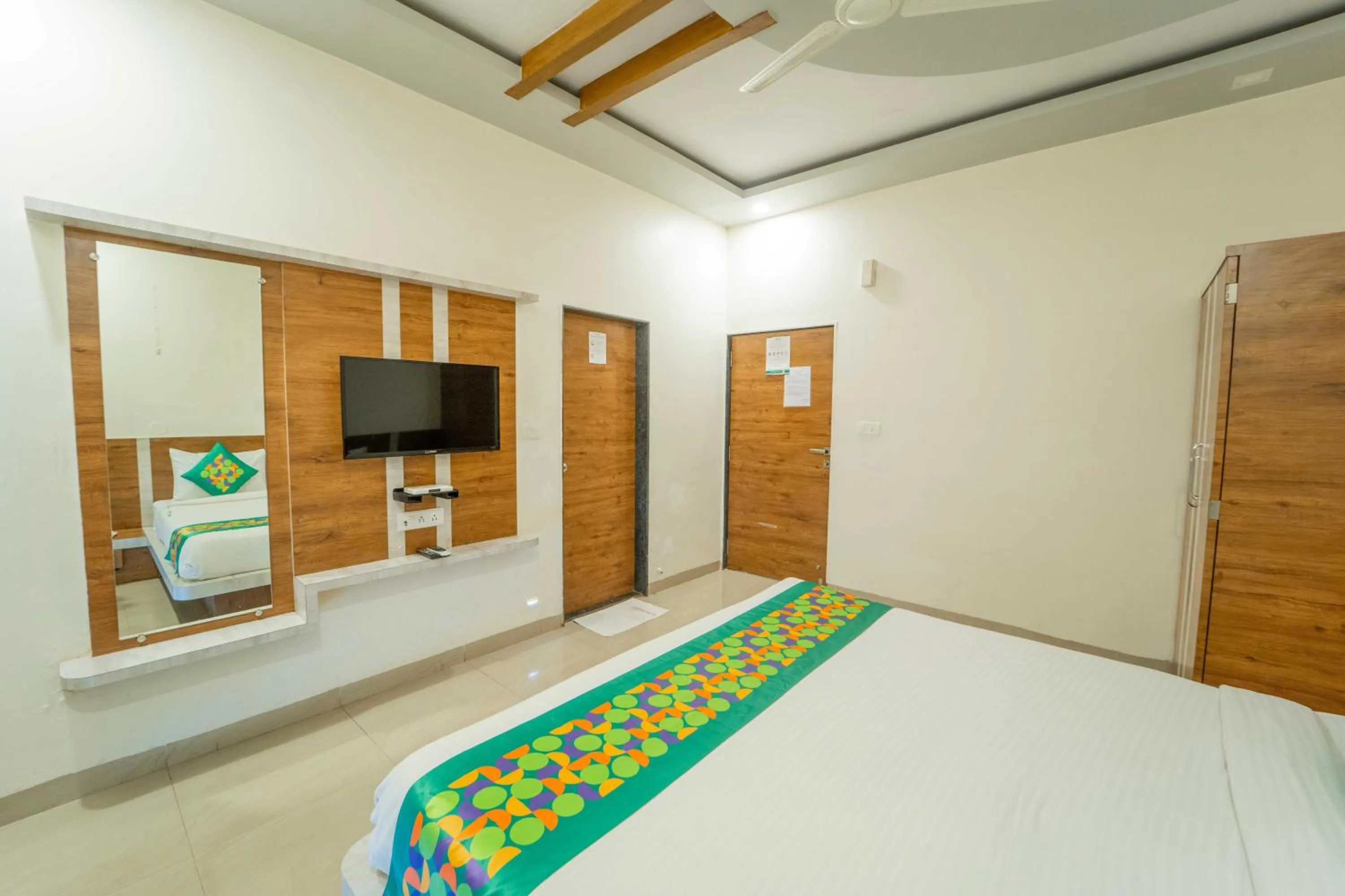 Bedroom, Bed in Treebo The Venna Hill