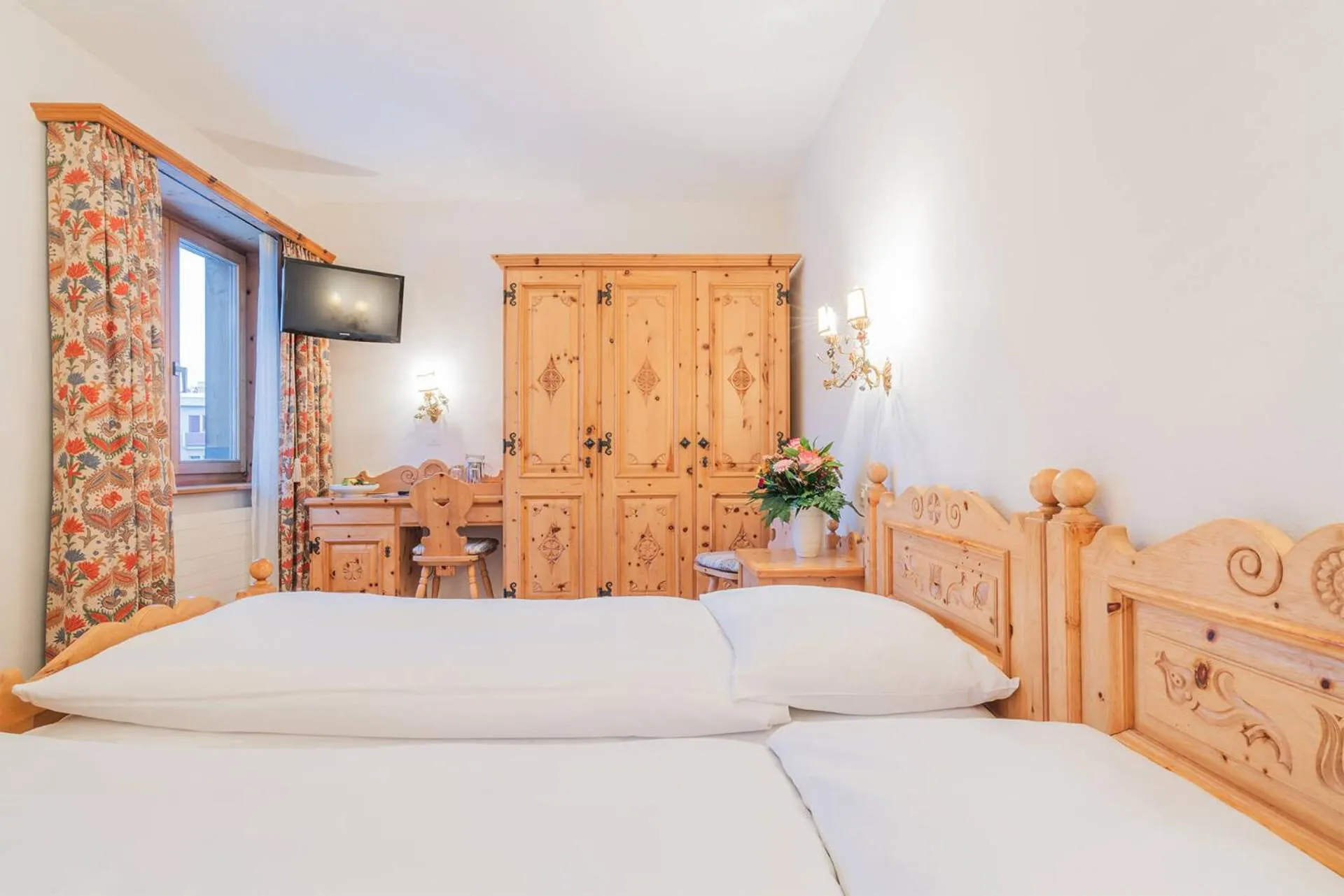 Bed in Hotel Corvatsch - Web Check-in