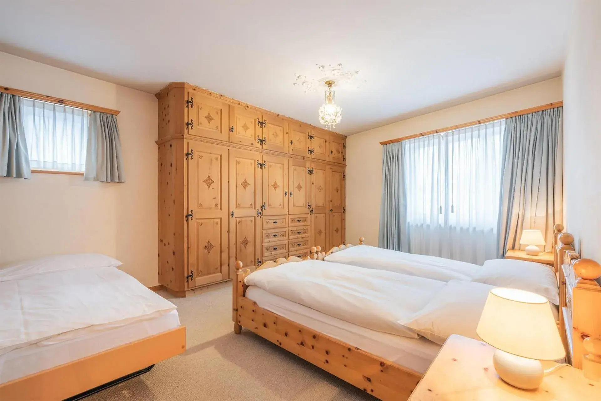 Photo of the whole room, Bed in Hotel Corvatsch - Web Check-in Photo of the whole room, Bed in Hotel Corvatsch - Web Check-in