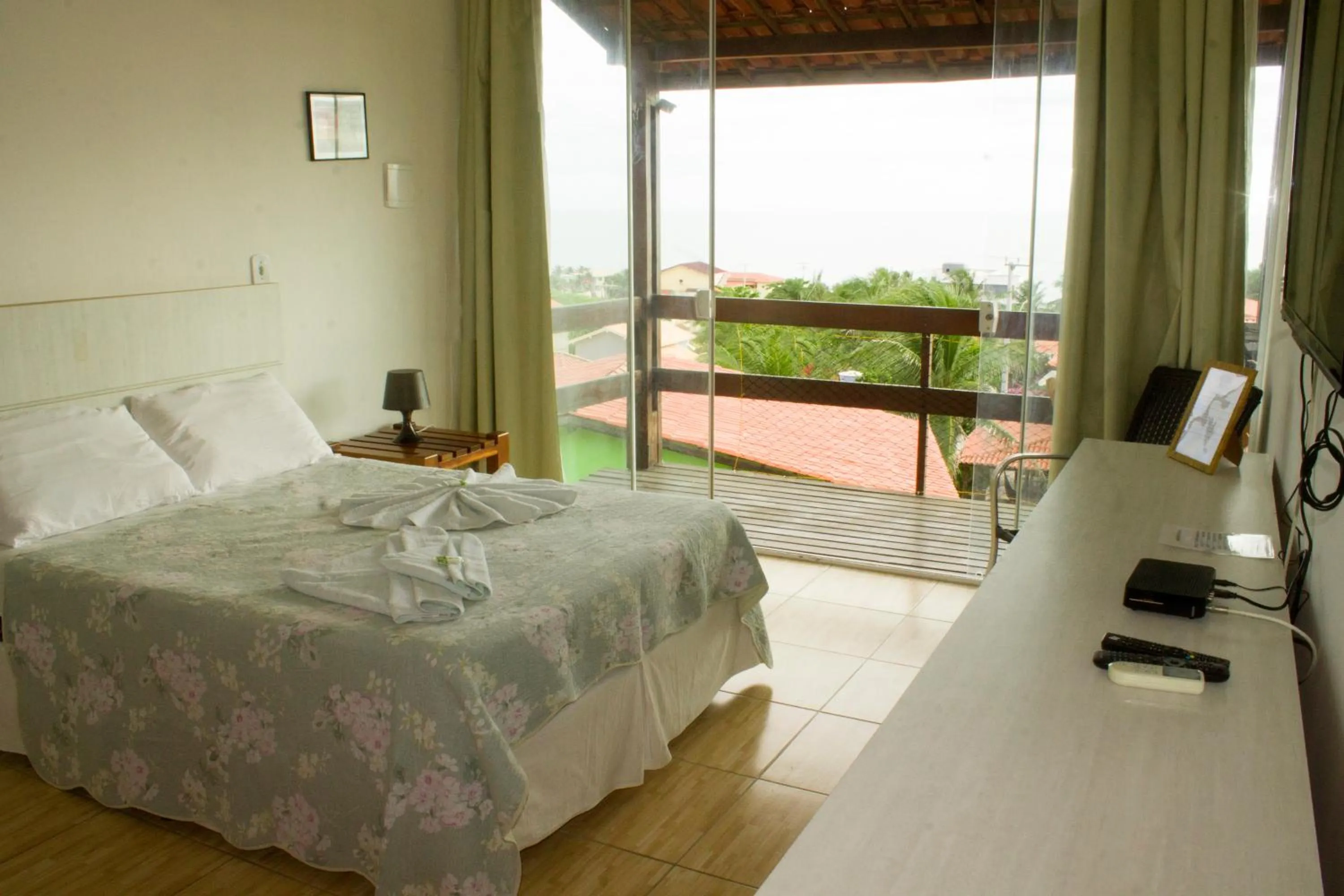 Photo of the whole room, Bed in Pousada Brisa da Canoa