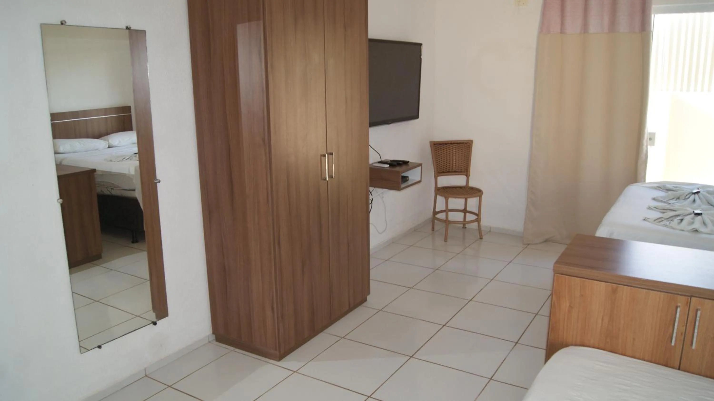 Bed in Pousada Brisa da Canoa