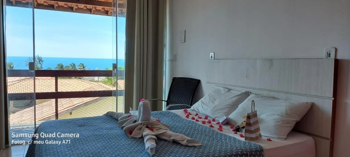 Bed in Pousada Brisa da Canoa