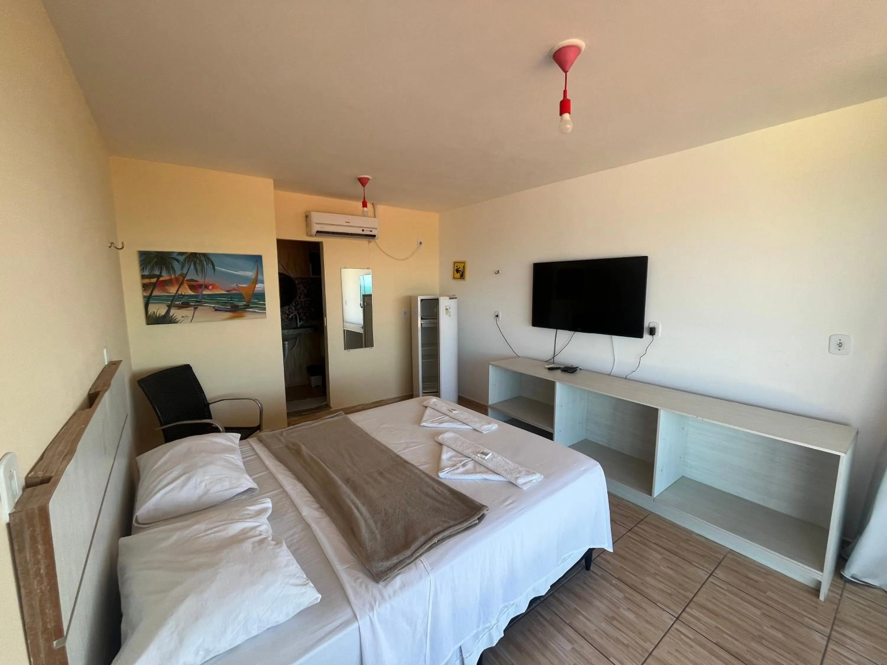 Bed in Pousada Brisa da Canoa