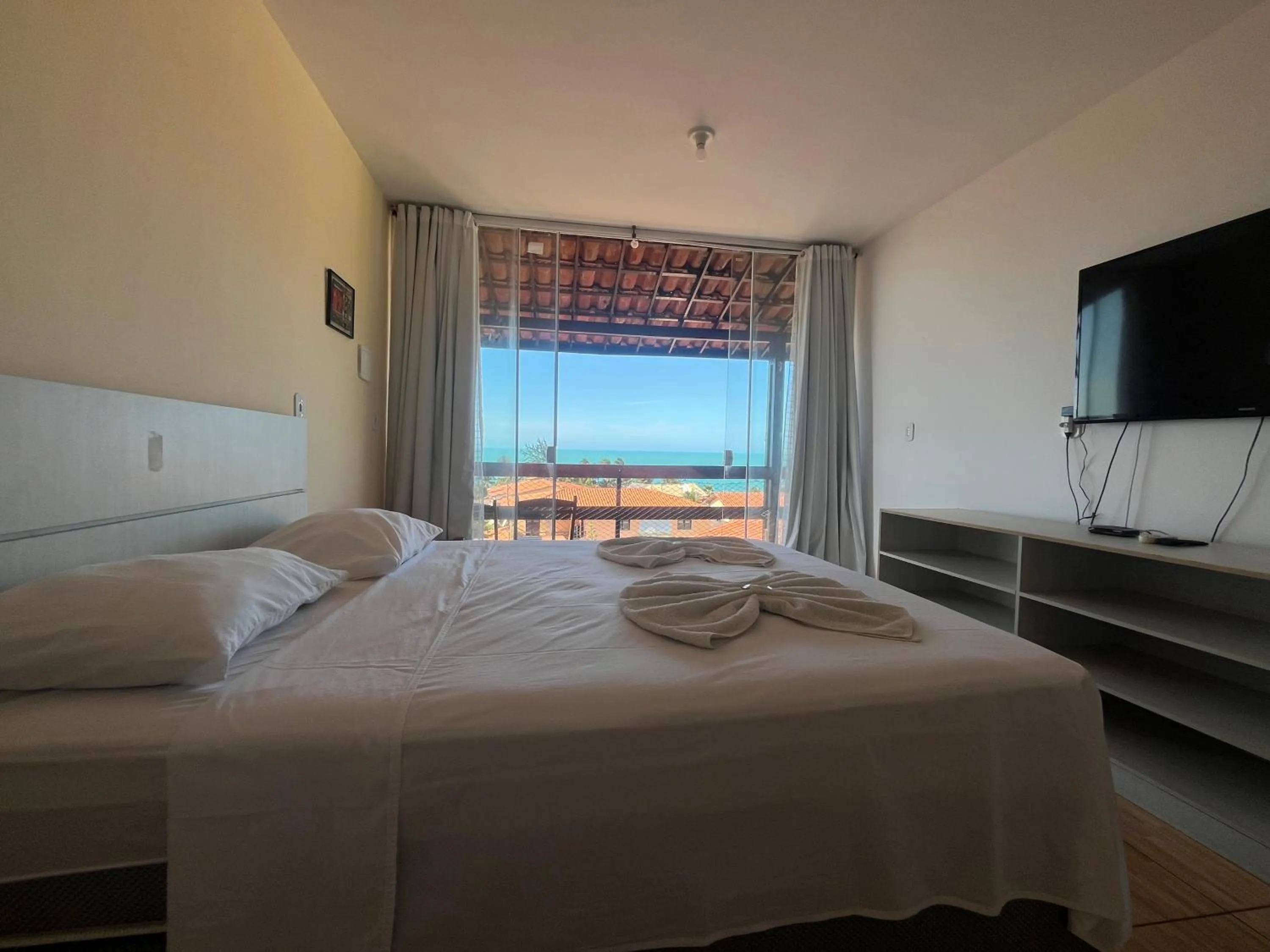 Bed in Pousada Brisa da Canoa