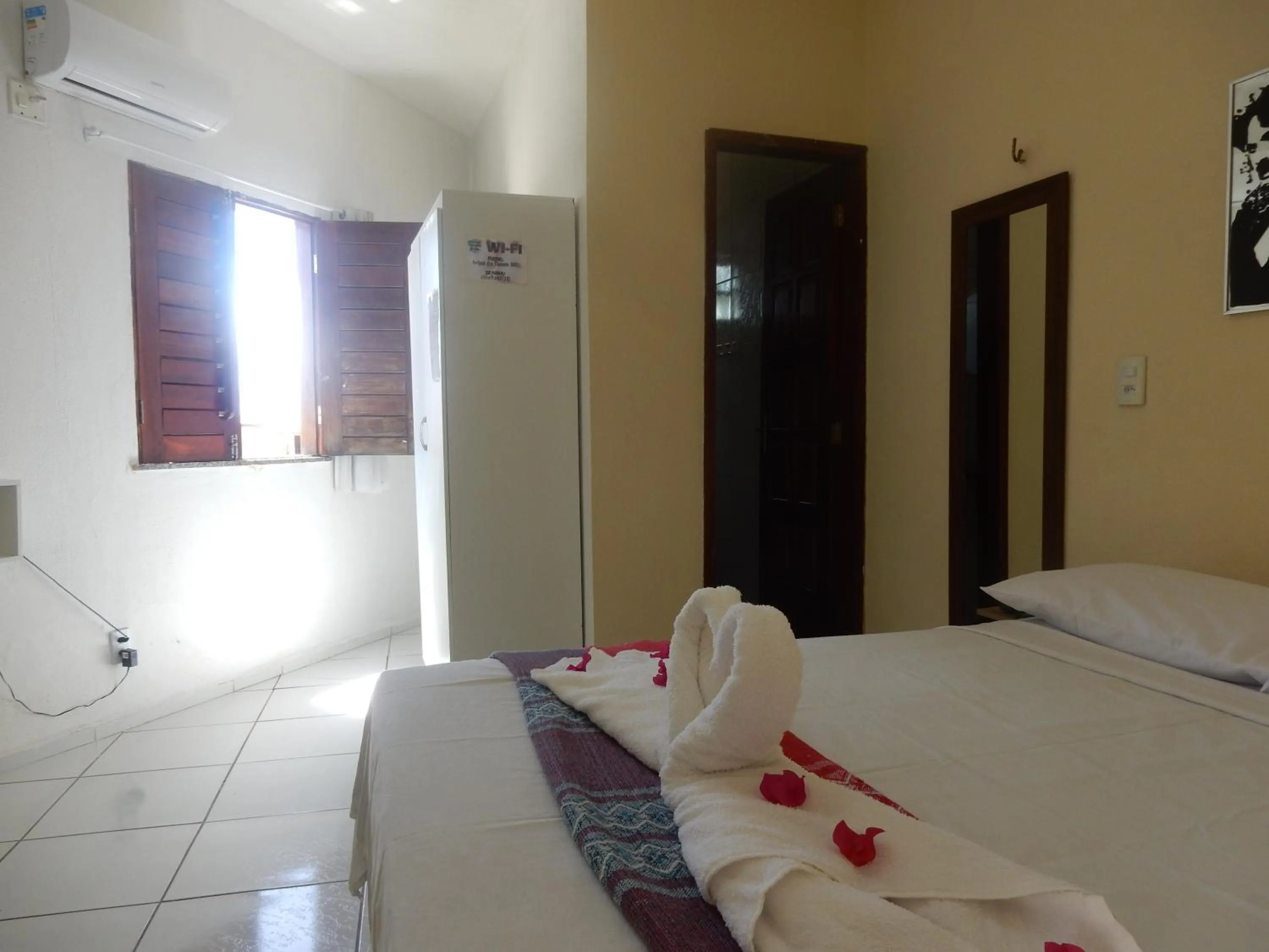 Bed in Pousada Brisa da Canoa