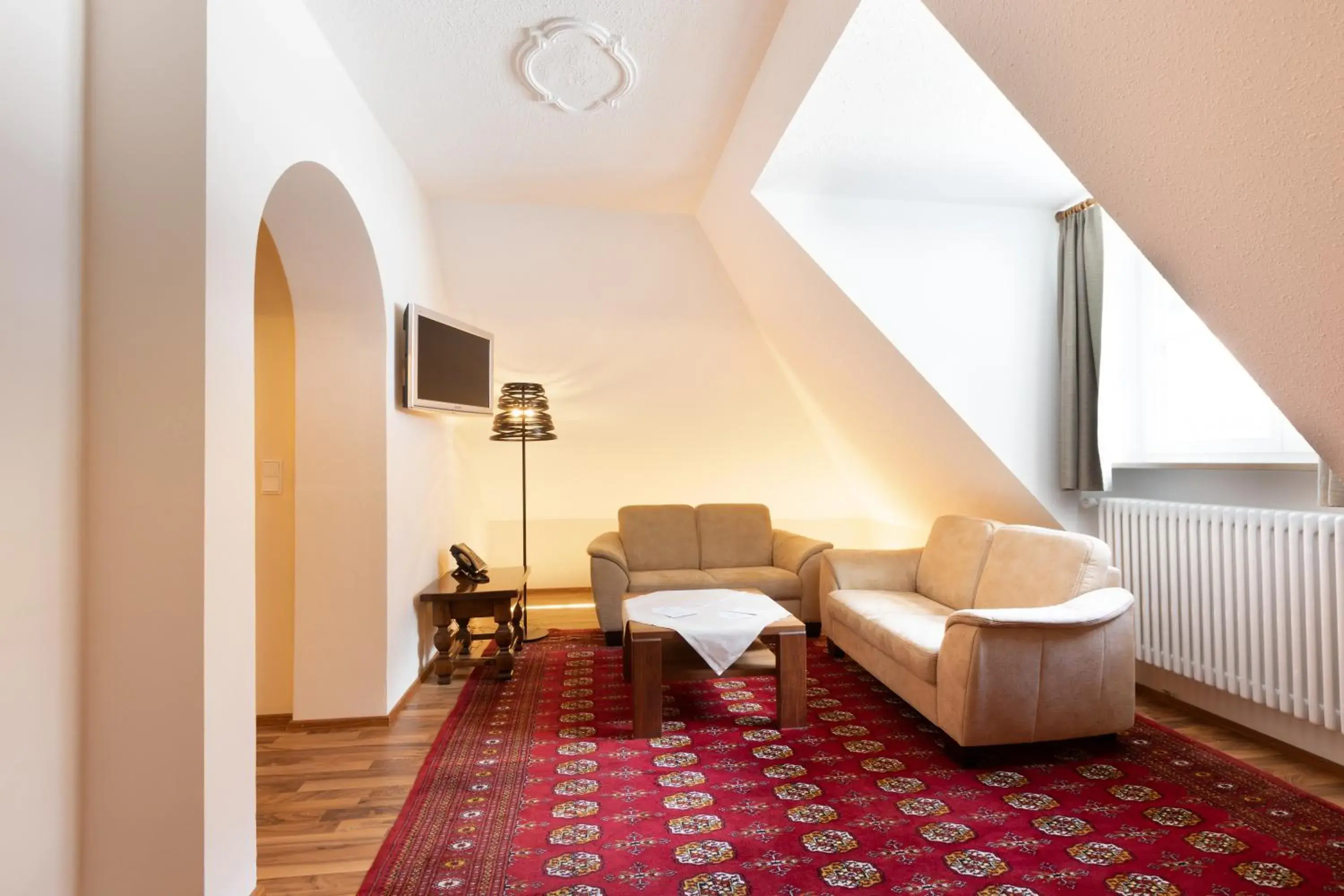 Seating area, Bed in Hotel Müller