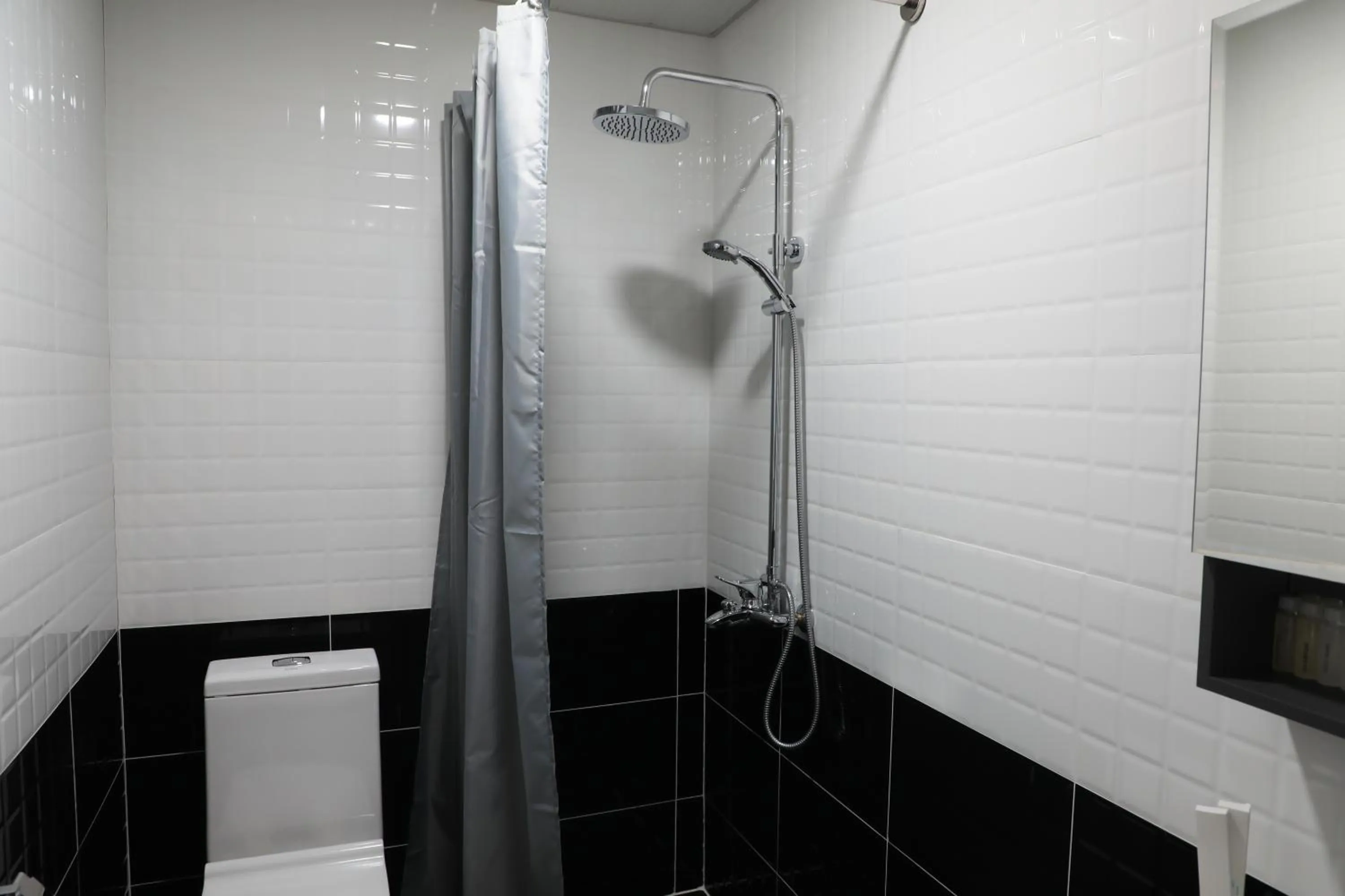 Shower in City INN Hotel