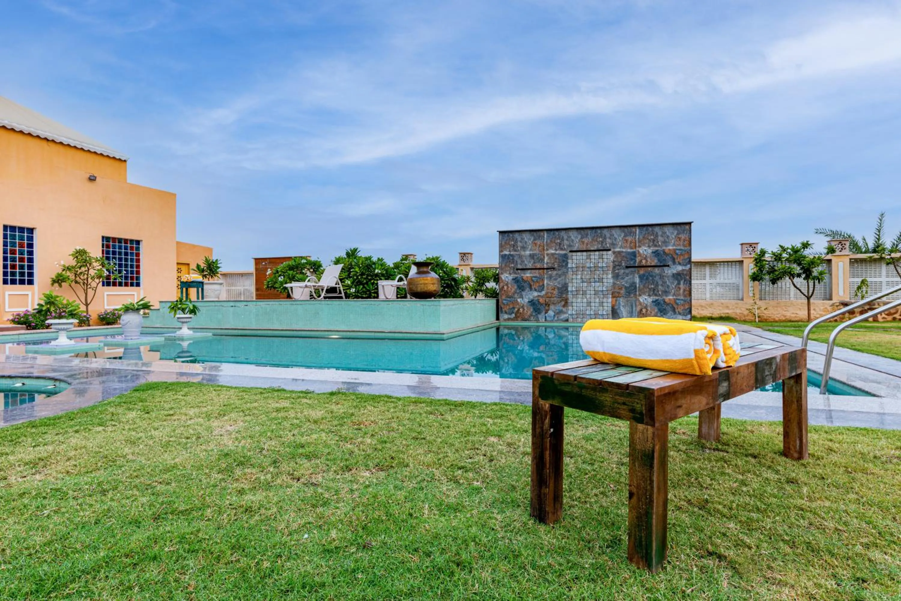 Swimming pool in Anand Bagh Resort & Spa by Ananta