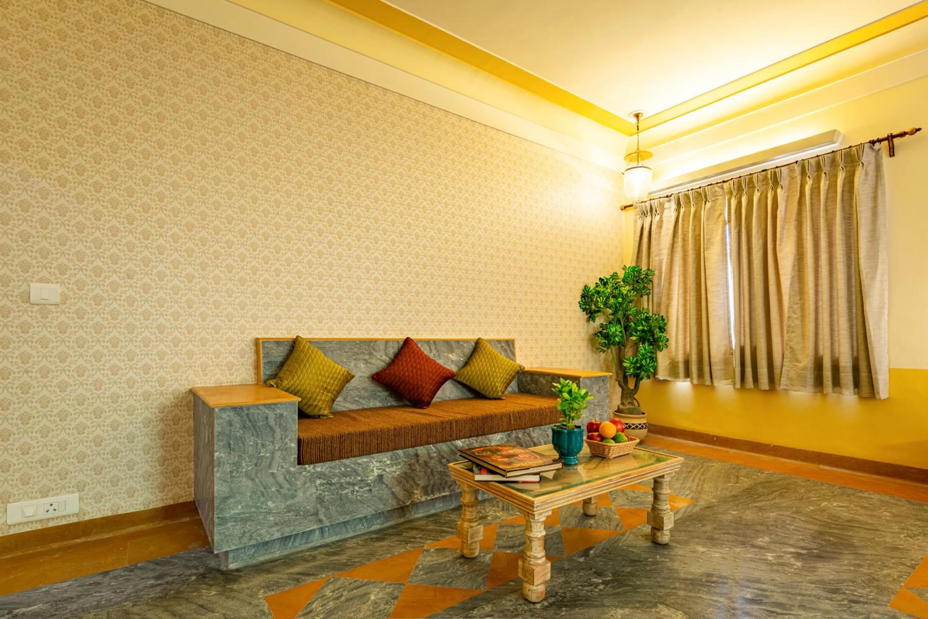 Seating area in Anand Bagh Resort & Spa by Ananta