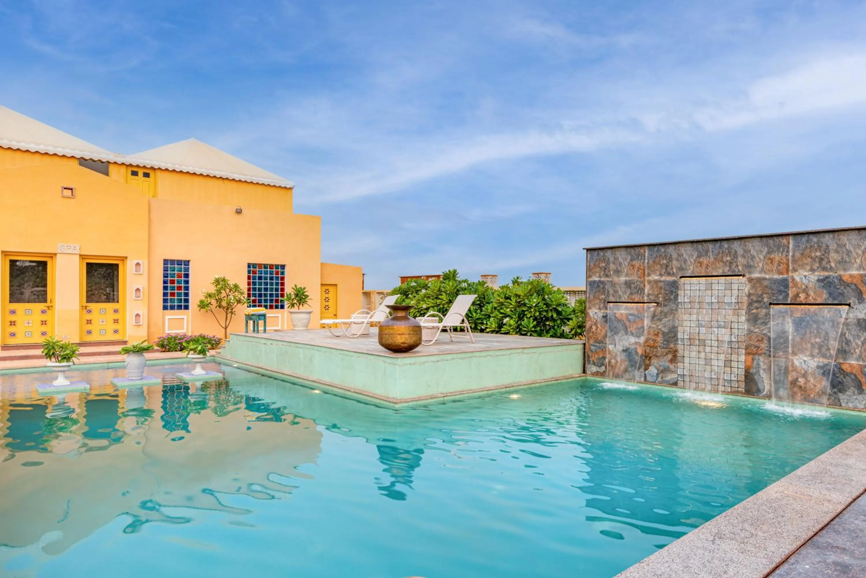 Swimming pool in Anand Bagh Resort & Spa by Ananta