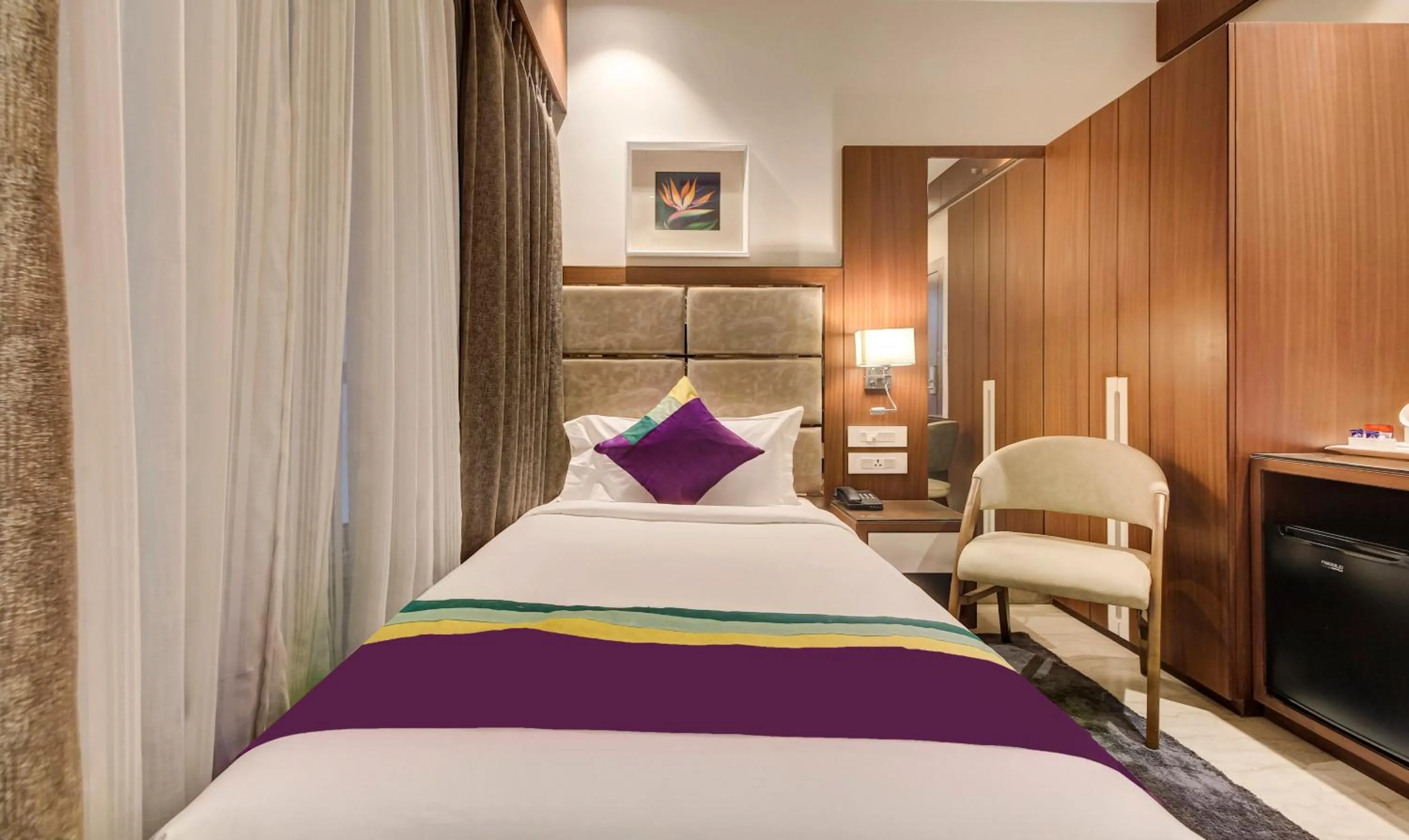 Bedroom, Bed in Treebo Premium Tahoora International