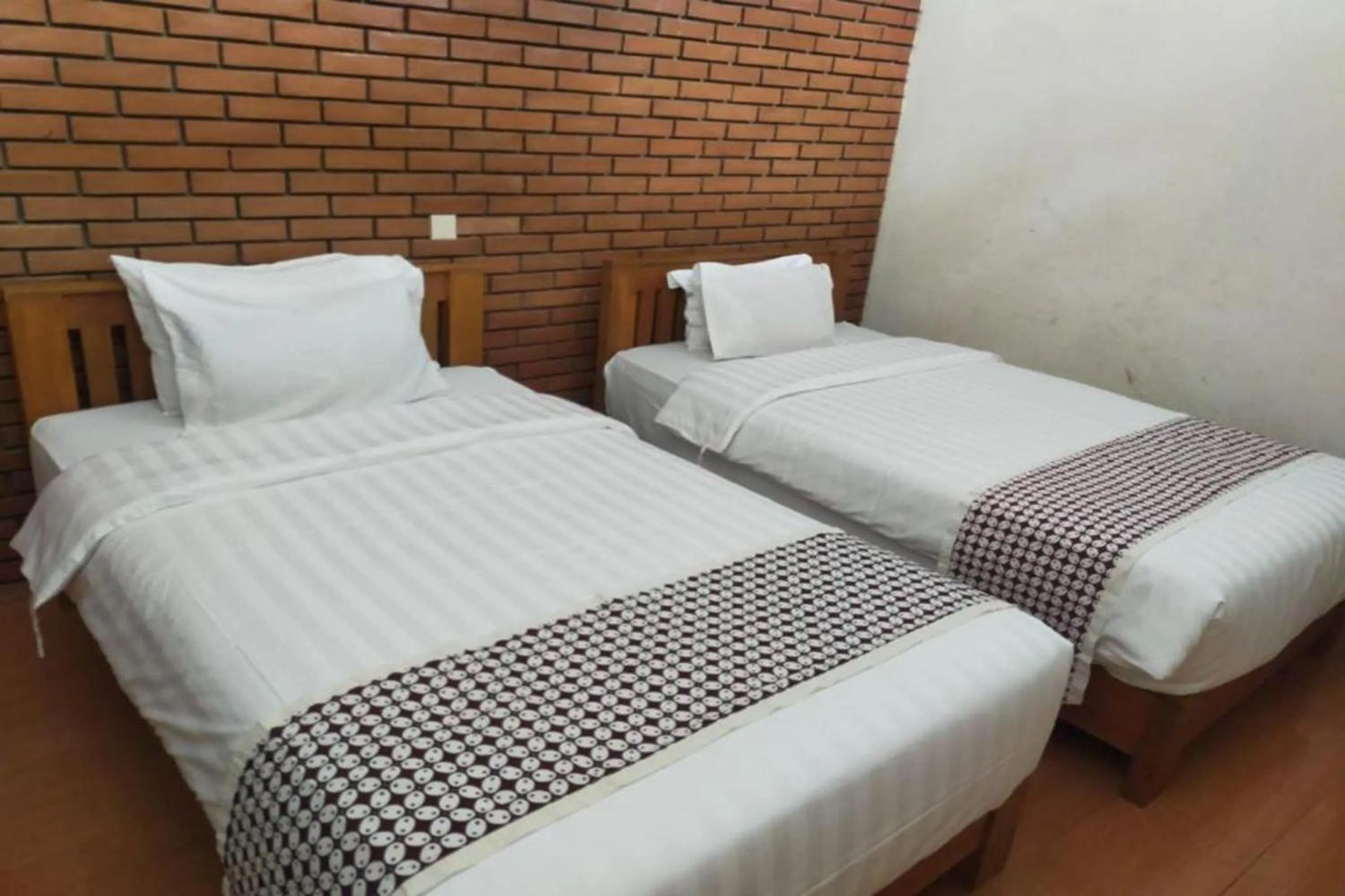 Bed in Omah Rohadi Syariah by Ndalem Beong