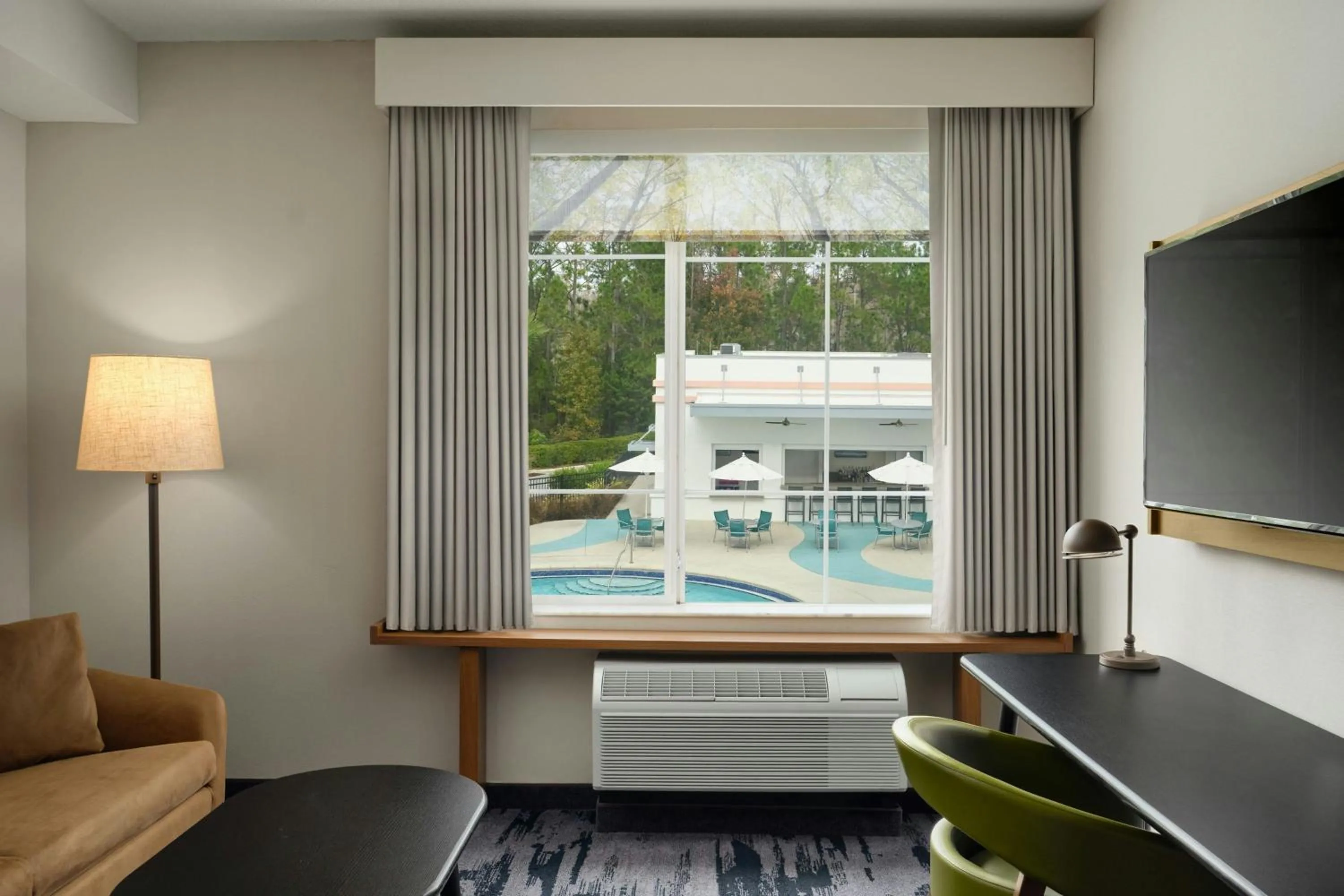 Swimming pool in Fairfield by Marriott Inn & Suites Orlando at FLAMINGO CROSSINGS® Town Center