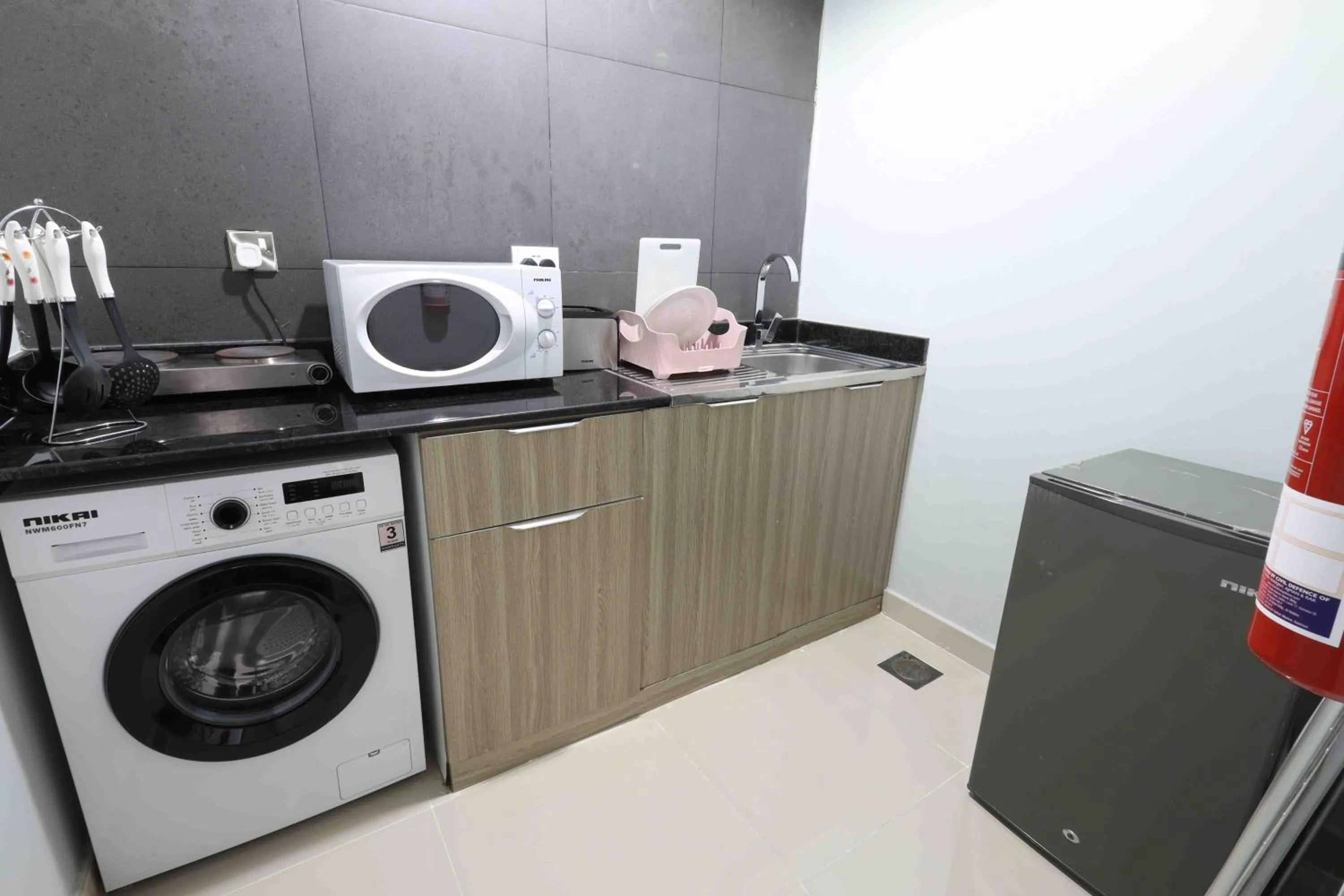 Kitchen or kitchenette in Fortis Hotel Fujairah