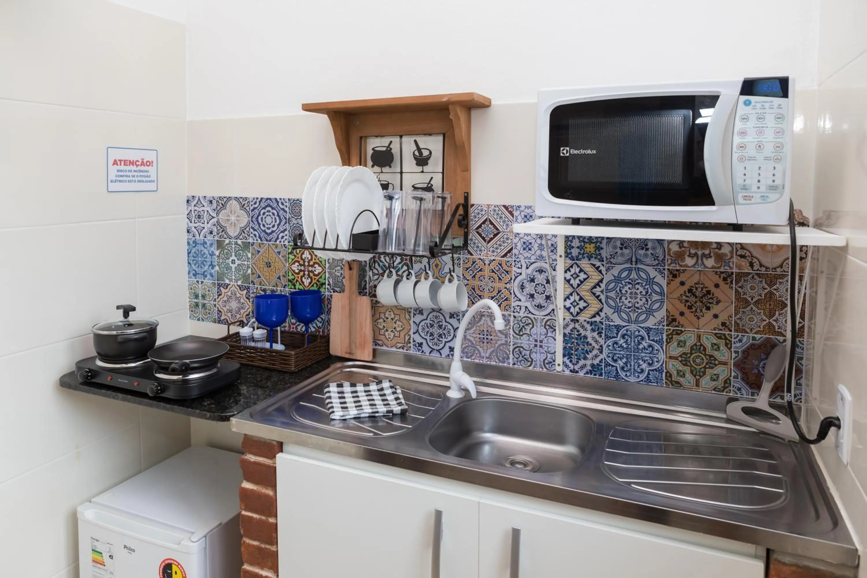 Kitchen or kitchenette in Suítes Curta Paraty, Família e PETs