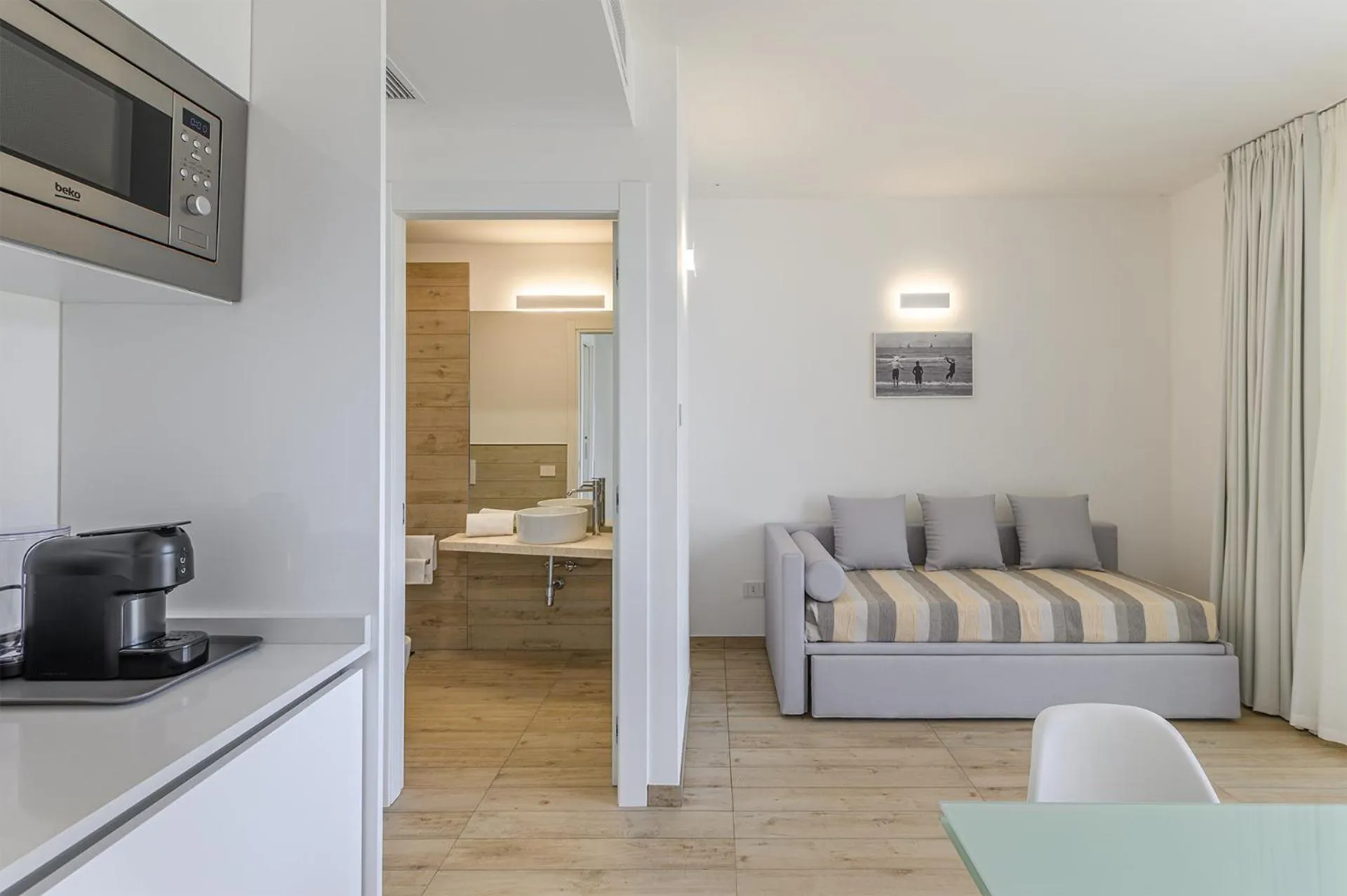 Living room in Capo Falcone Charming Apartments