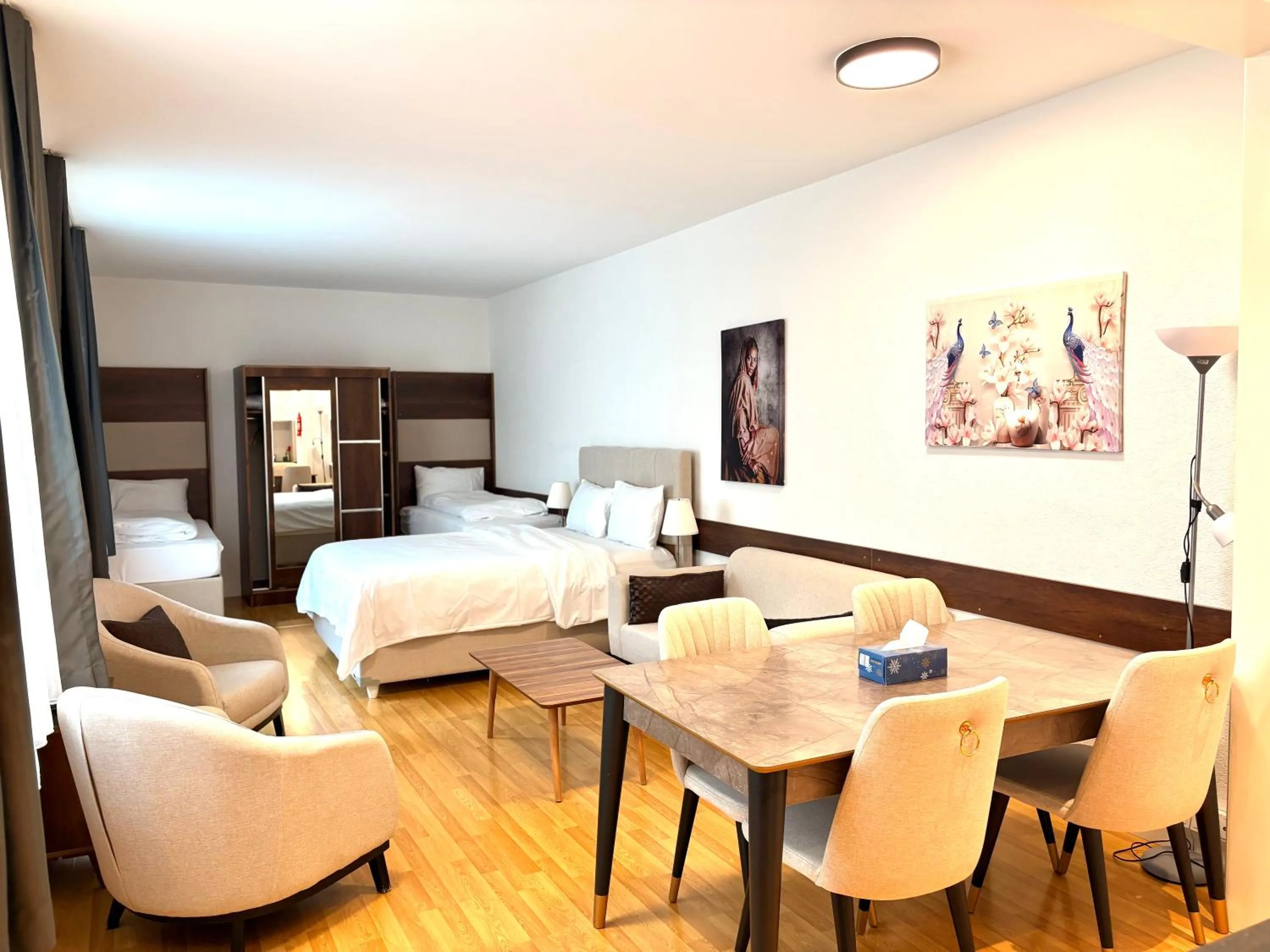 Living room, Bed in Akomo Bern