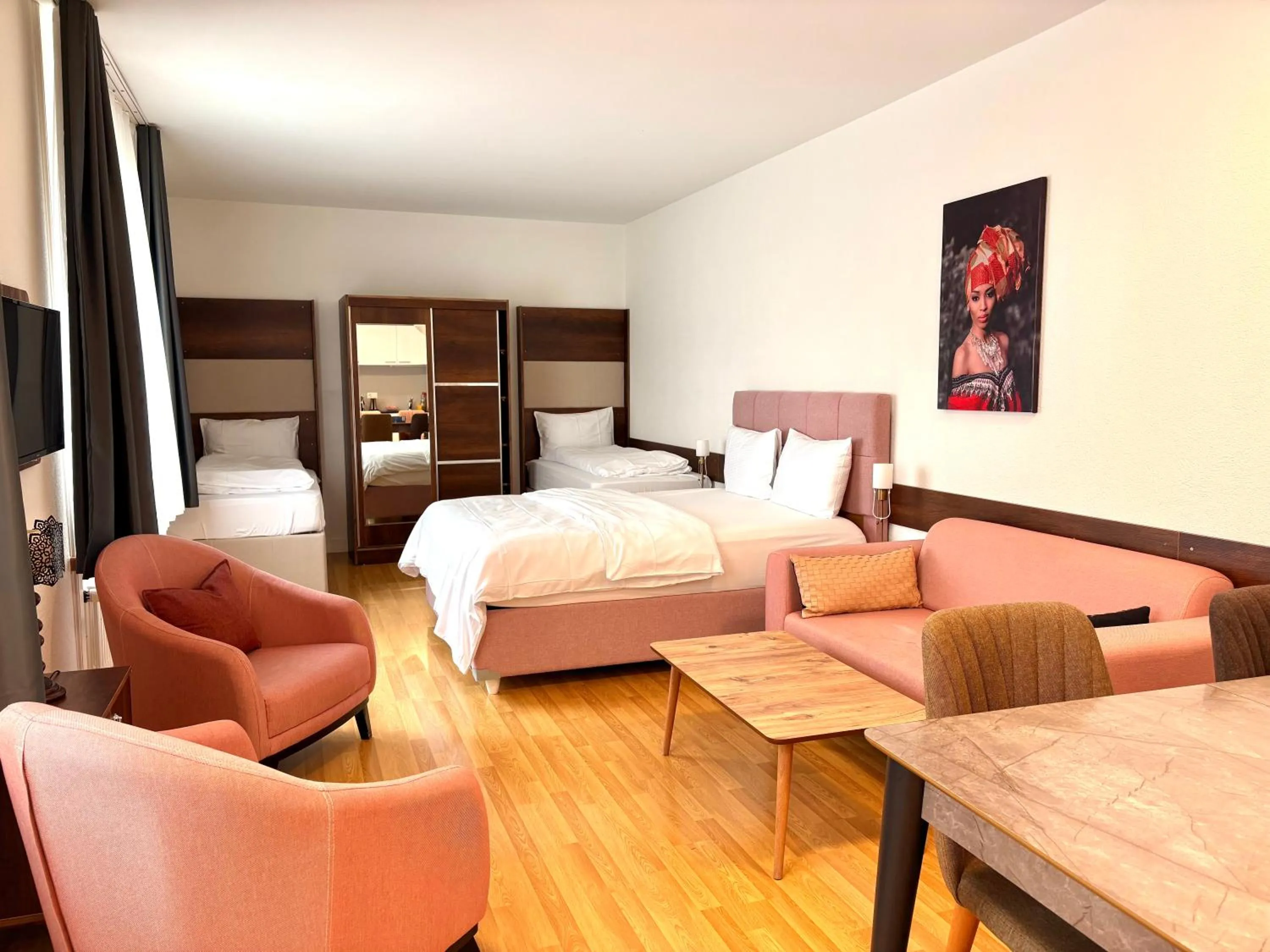 Living room, Bed in Akomo Bern