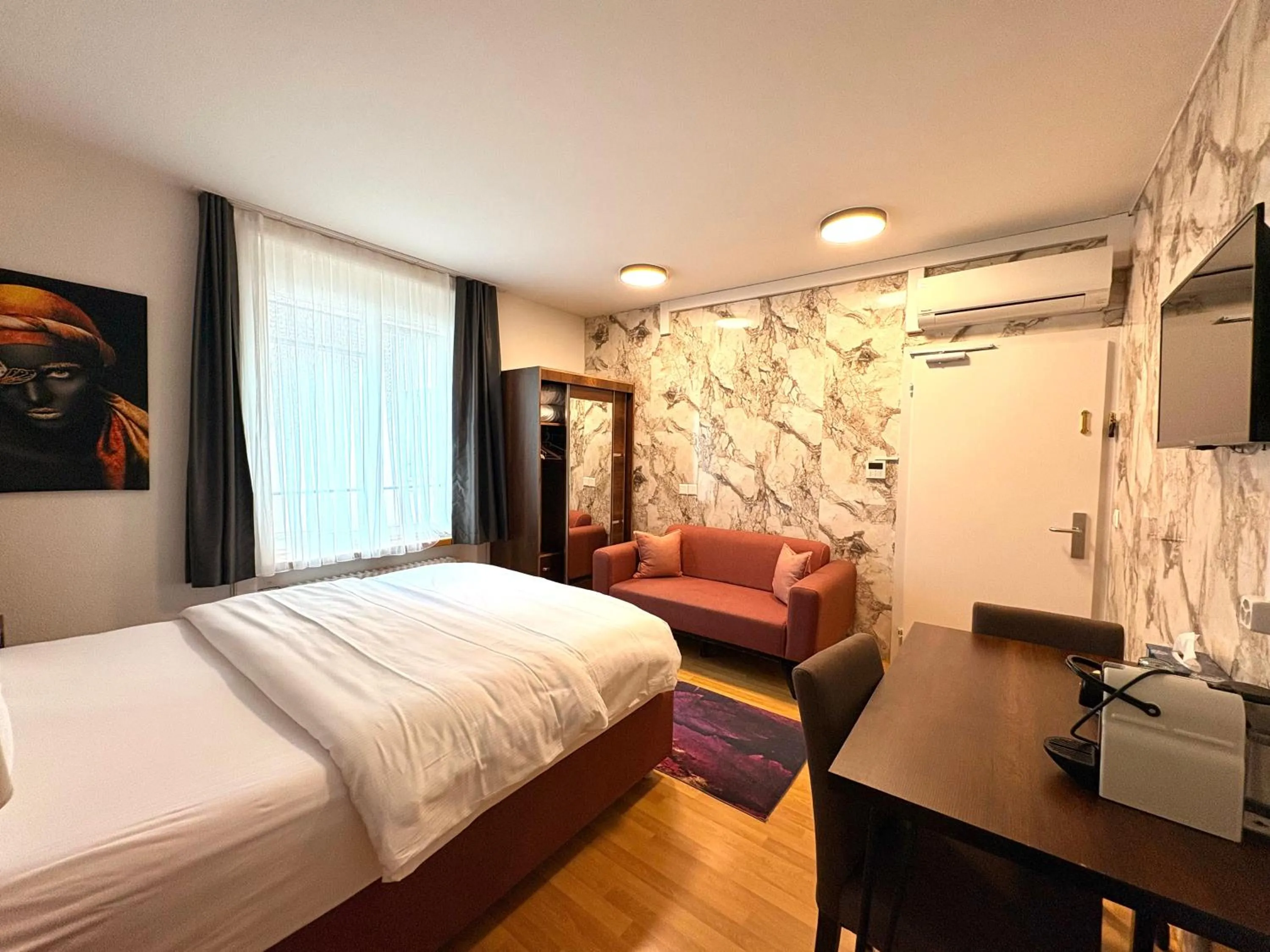 Living room, Bed in Akomo Bern