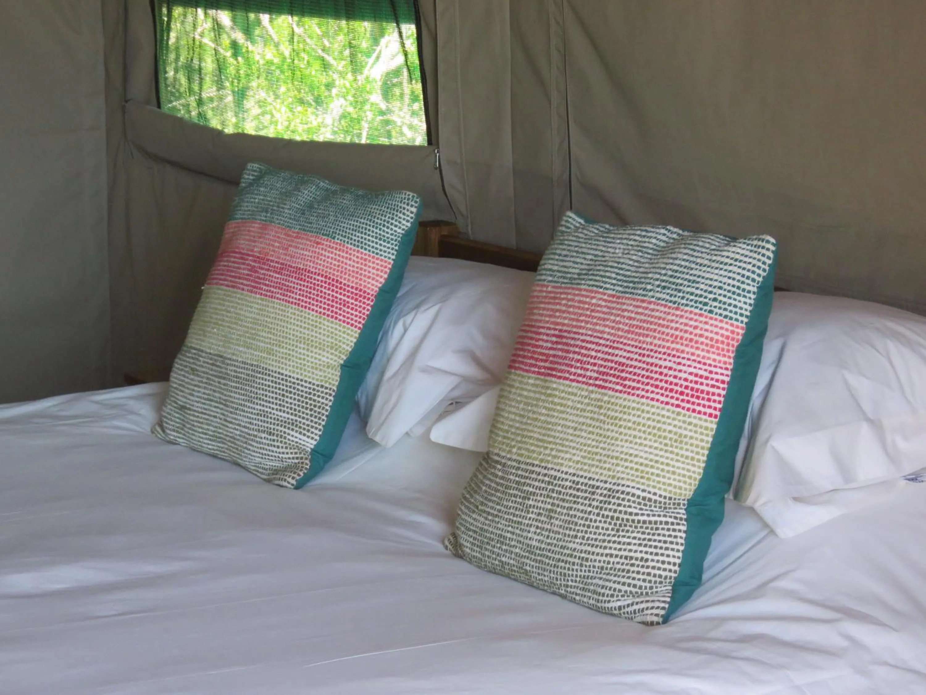 Bed in Woodbury Tented Camp – Amakhala Game Reserve